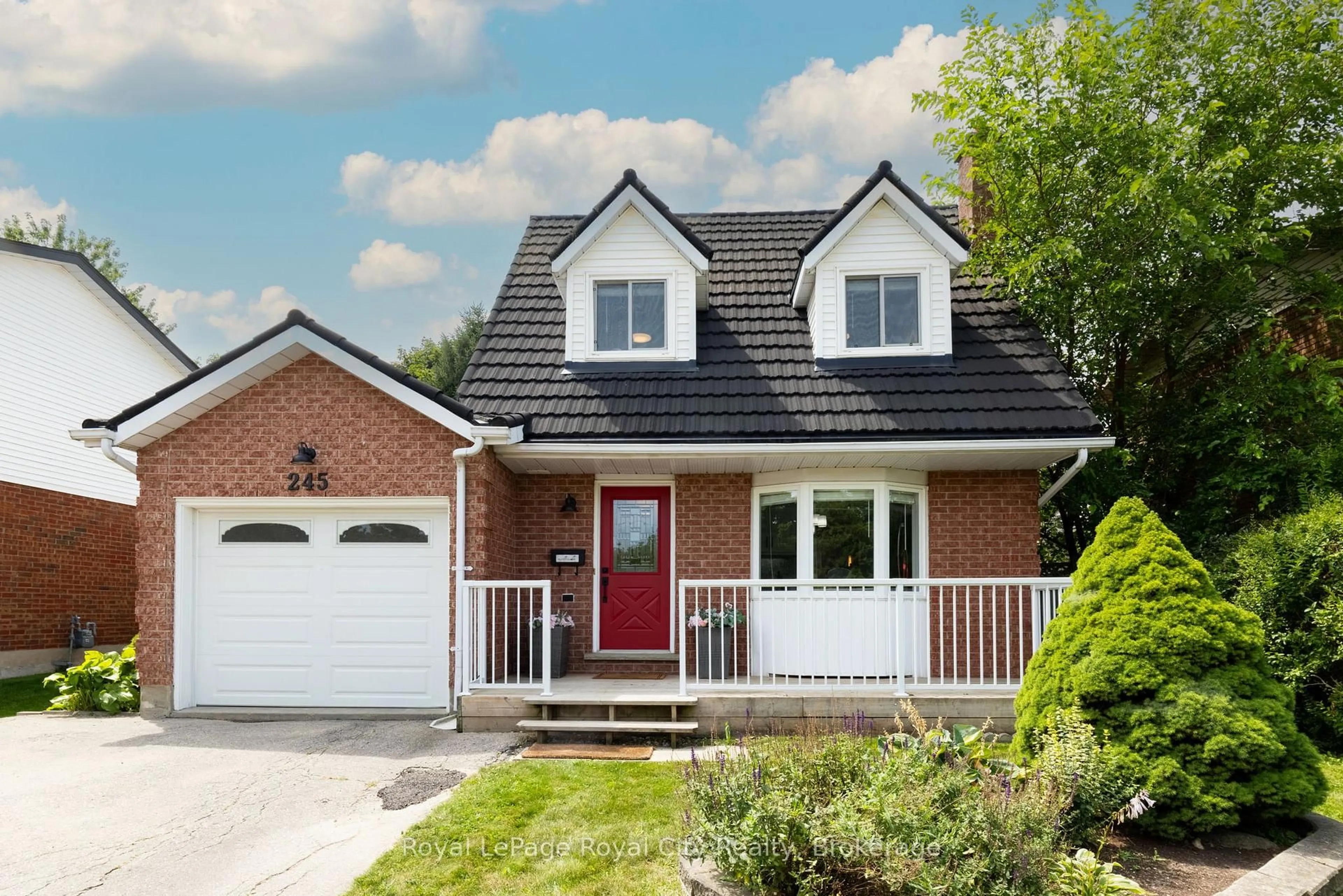 Home with brick exterior material, street for 245 Elmira Rd, Guelph Ontario N1K 1R1
