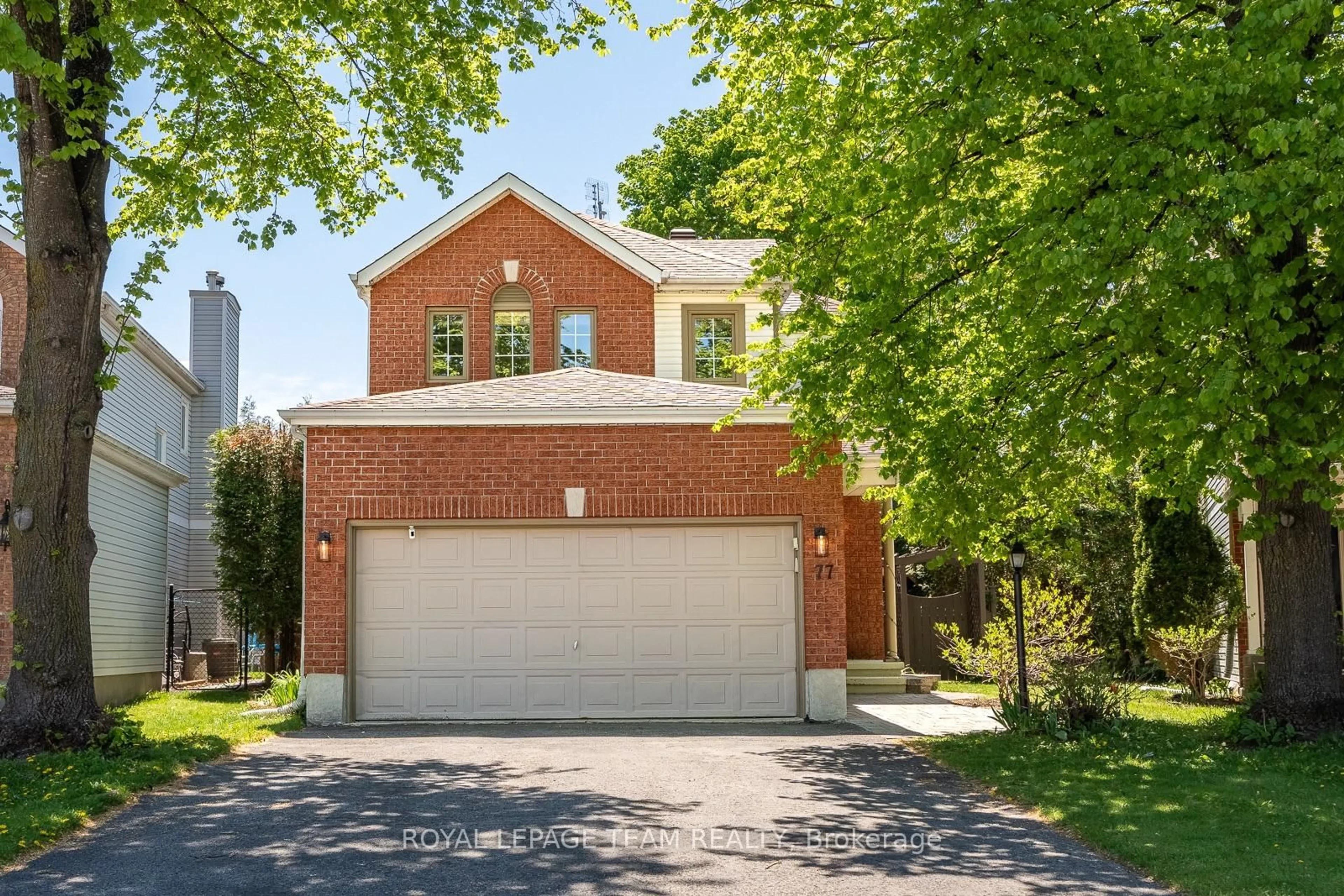 Home with brick exterior material, street for 77 Armagh Way, Ottawa Ontario K2J 4C1