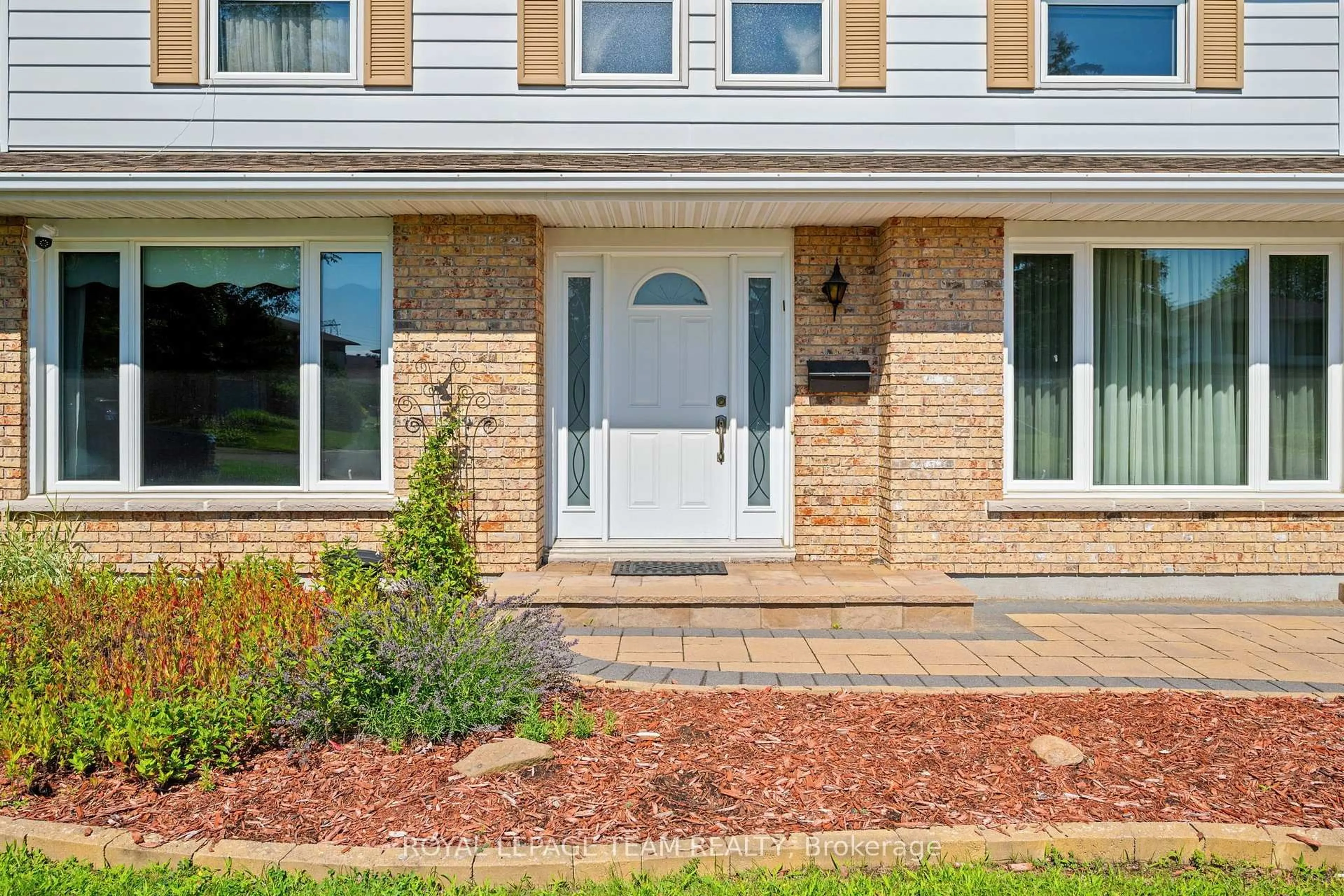 Home with brick exterior material, street for 22 Markham Ave, Ottawa Ontario K2G 3Y2