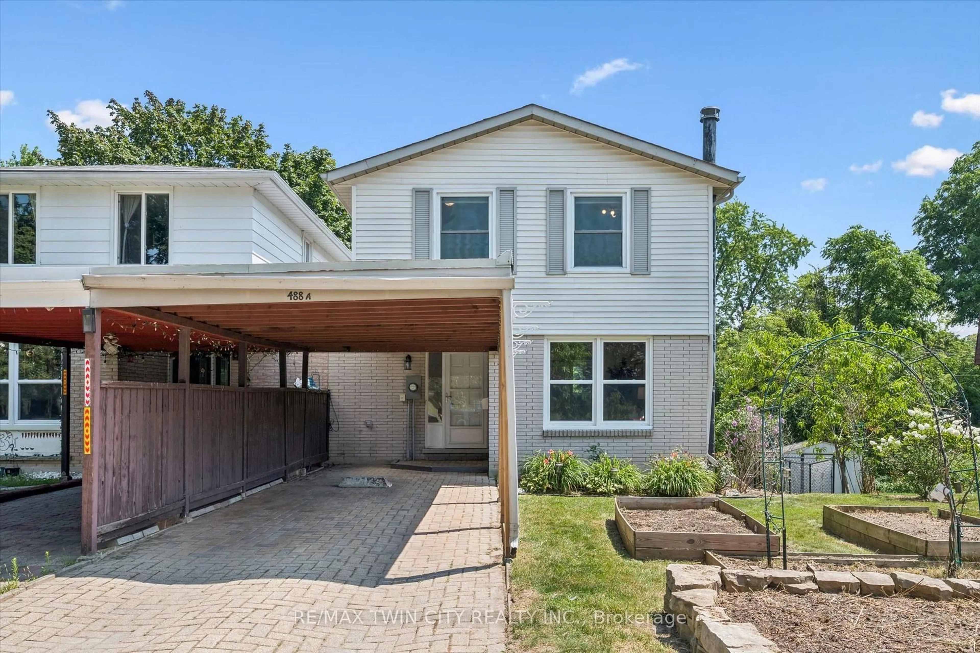 Home with brick exterior material, street for 488 Glenelm Cres #A, Waterloo Ontario N2L 5C8