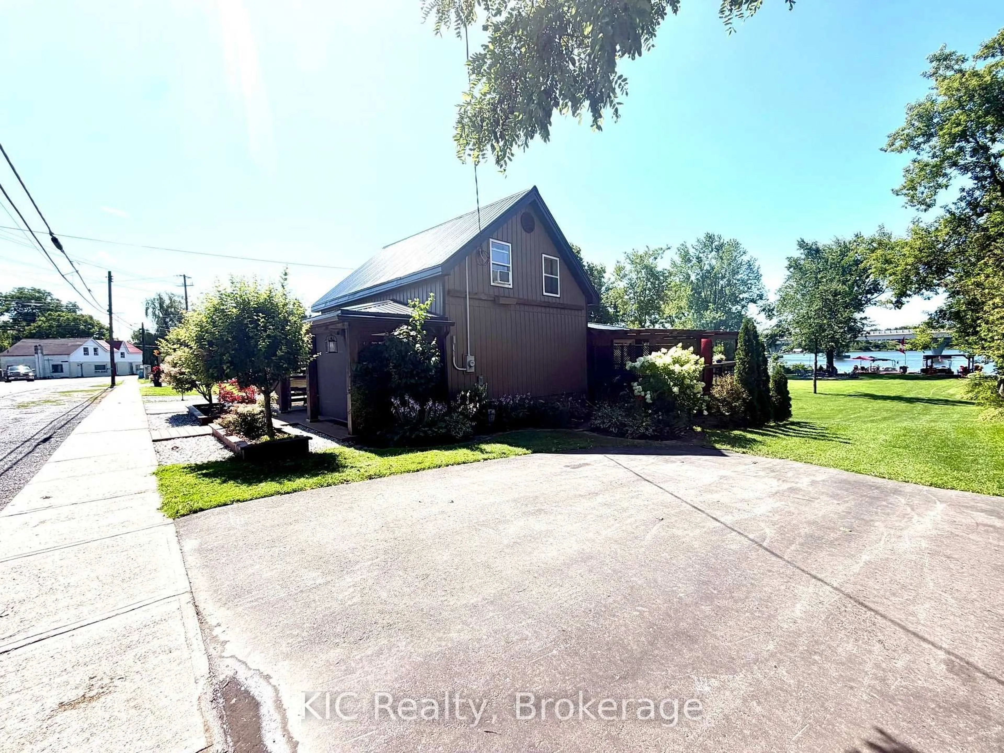 A pic from outside/outdoor area/front of a property/back of a property/a pic from drone, water/lake/river/ocean view for 661 Church St, Trent Hills Ontario K0L 1Z0