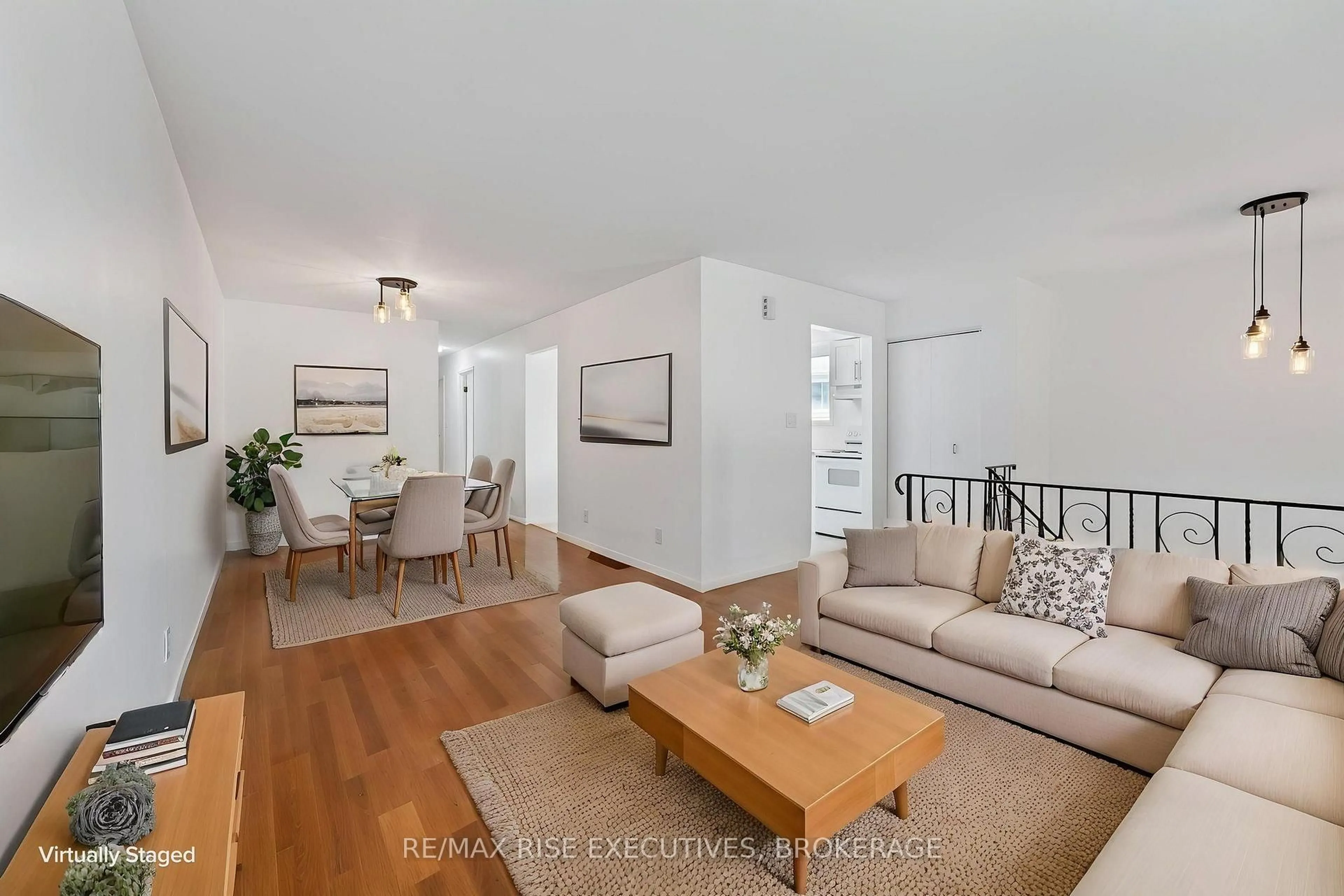 Living room with furniture, wood/laminate floor for 385 Melanie Ave, Kingston Ontario K7M 8B2