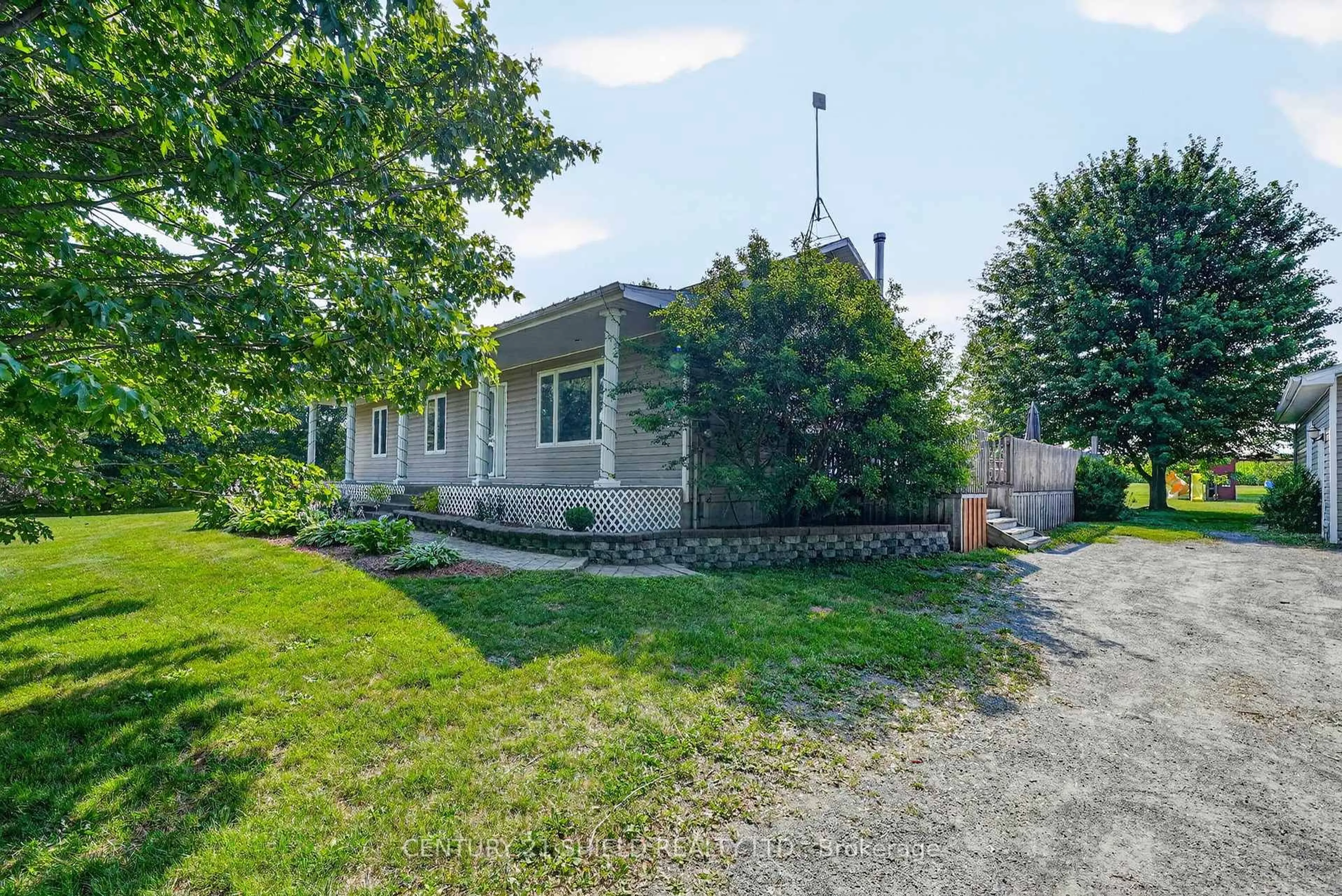 A pic from outside/outdoor area/front of a property/back of a property/a pic from drone, street for 17614 Bloomington Rd, North Stormont Ontario K0C 1T0