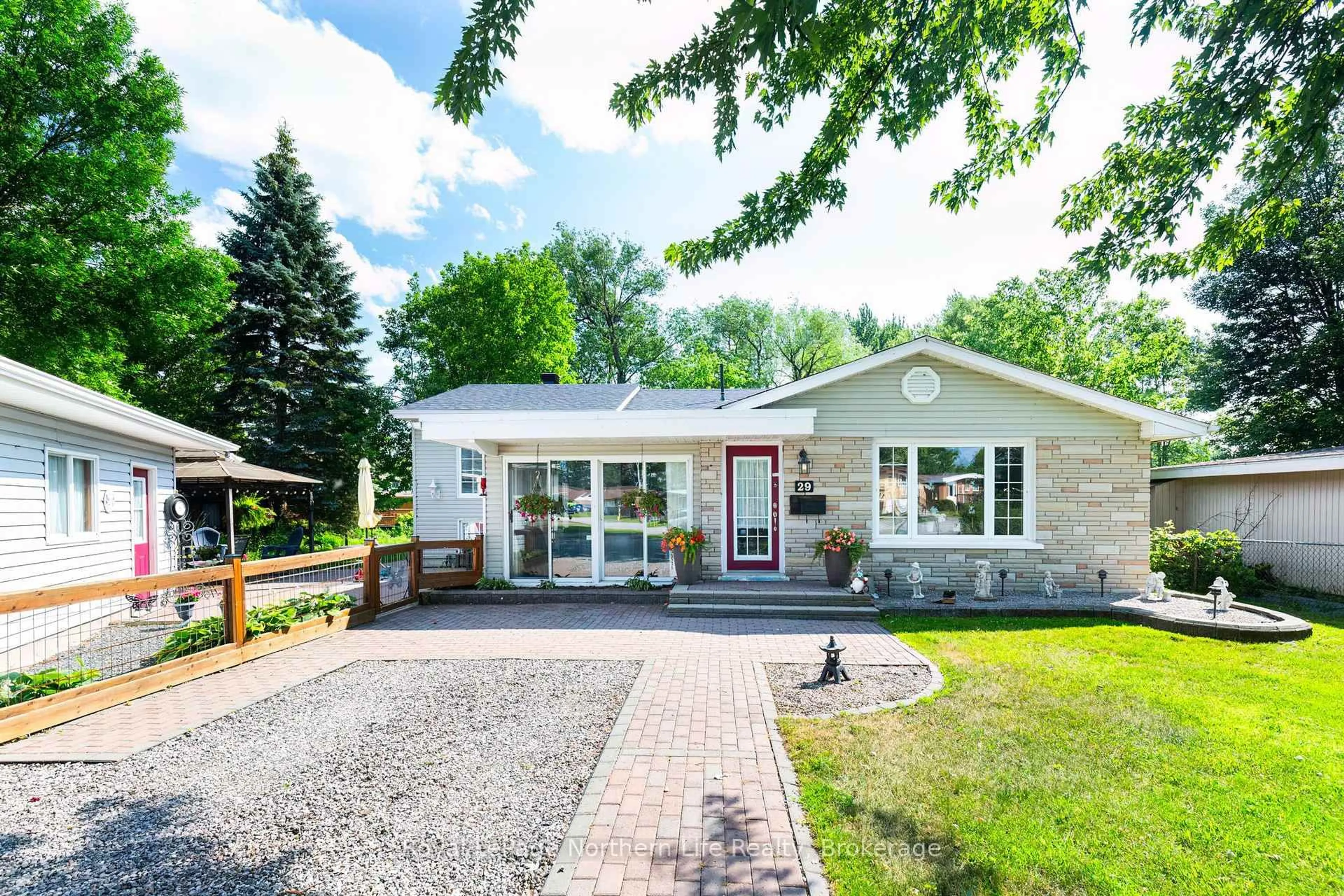 Home with vinyl exterior material, street for 29 Marshall Park Dr, North Bay Ontario P1A 2N8