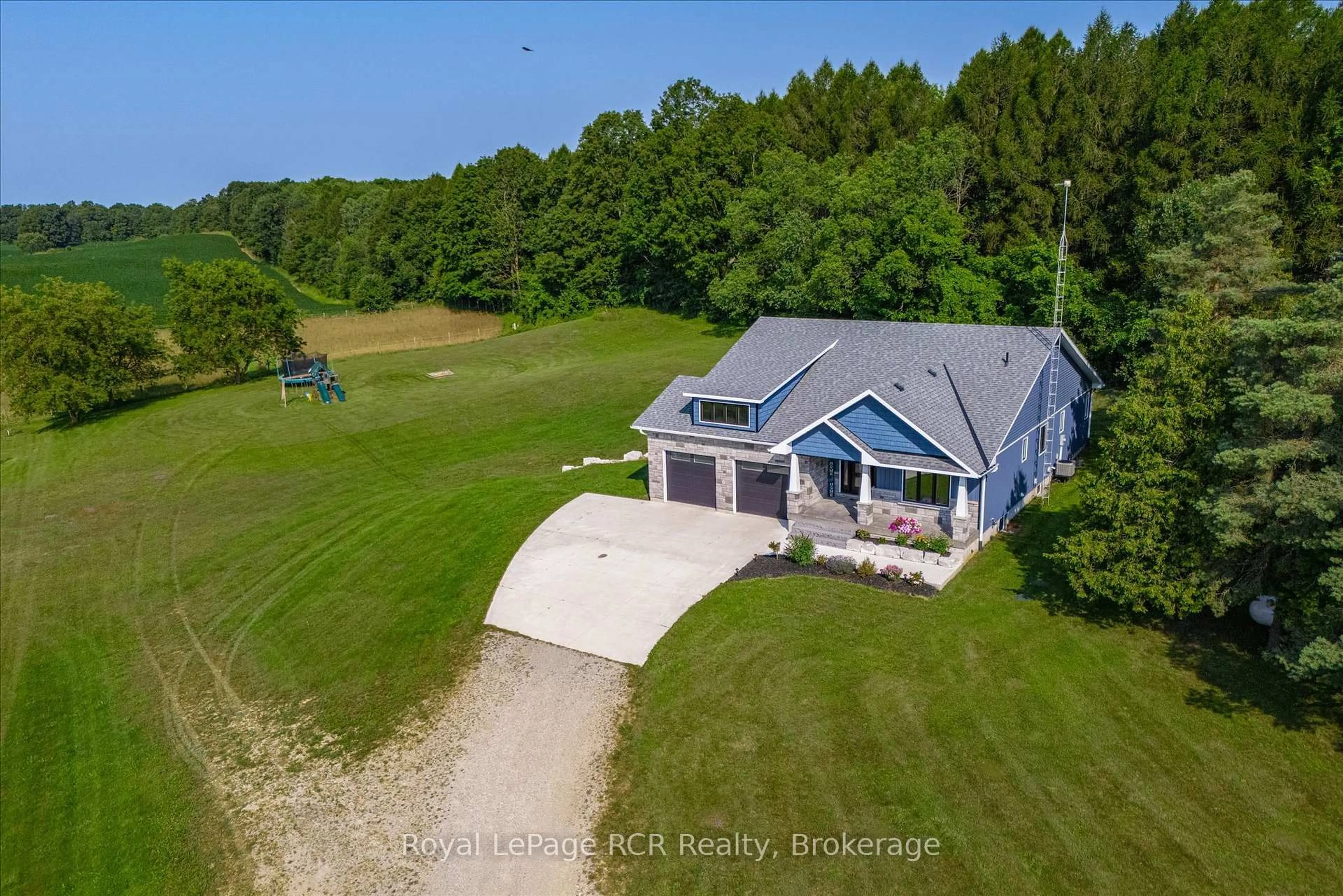 A pic from outside/outdoor area/front of a property/back of a property/a pic from drone, water/lake/river/ocean view for 231658 Concession 2, RR3, West Grey Ontario N0G 1C0