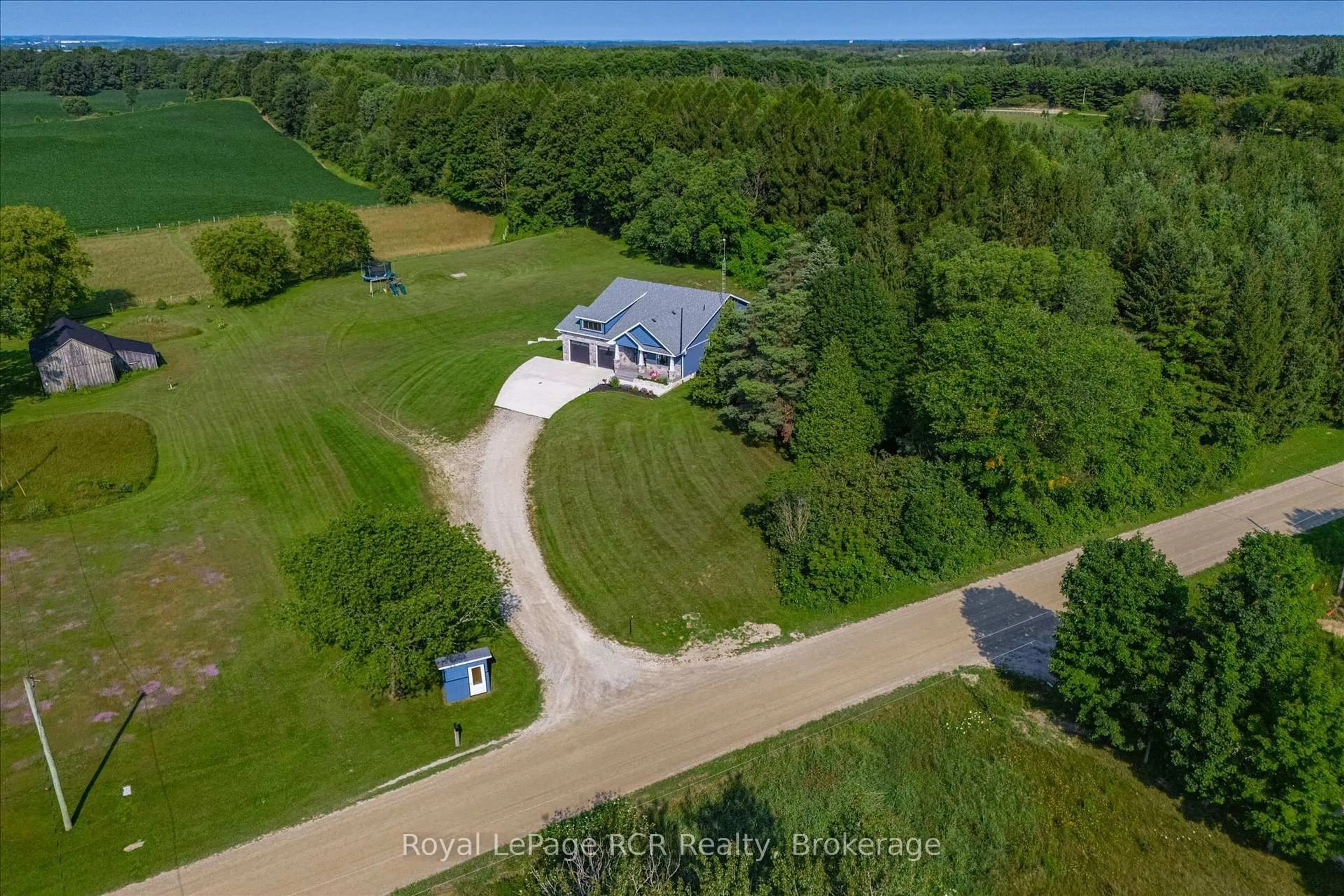 A pic from outside/outdoor area/front of a property/back of a property/a pic from drone, water/lake/river/ocean view for 231658 Concession 2, RR3, West Grey Ontario N0G 1C0