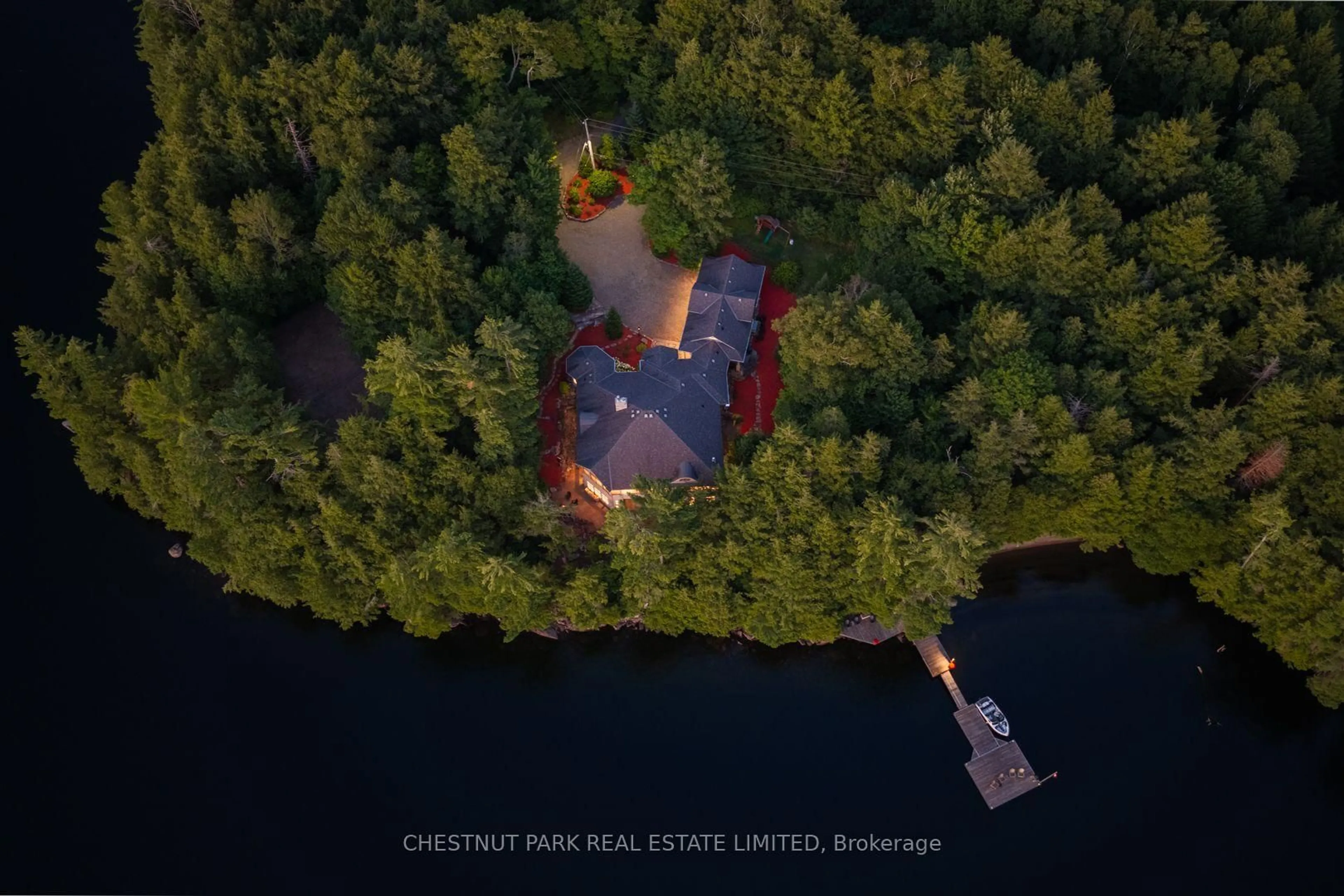 A pic from outside/outdoor area/front of a property/back of a property/a pic from drone, water/lake/river/ocean view for 2458 Wilkinson Rd, Dysart et al Ontario K0M 1S0