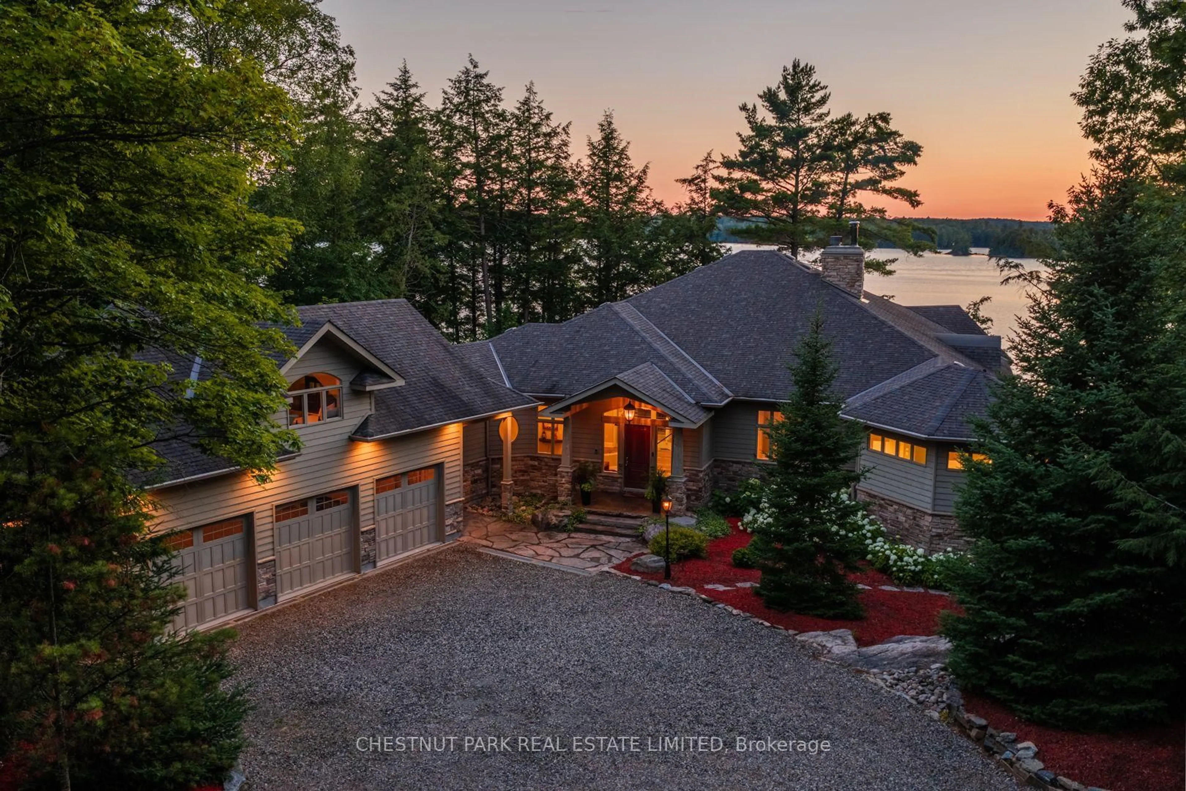 A pic from outside/outdoor area/front of a property/back of a property/a pic from drone, water/lake/river/ocean view for 2458 Wilkinson Rd, Dysart et al Ontario K0M 1S0