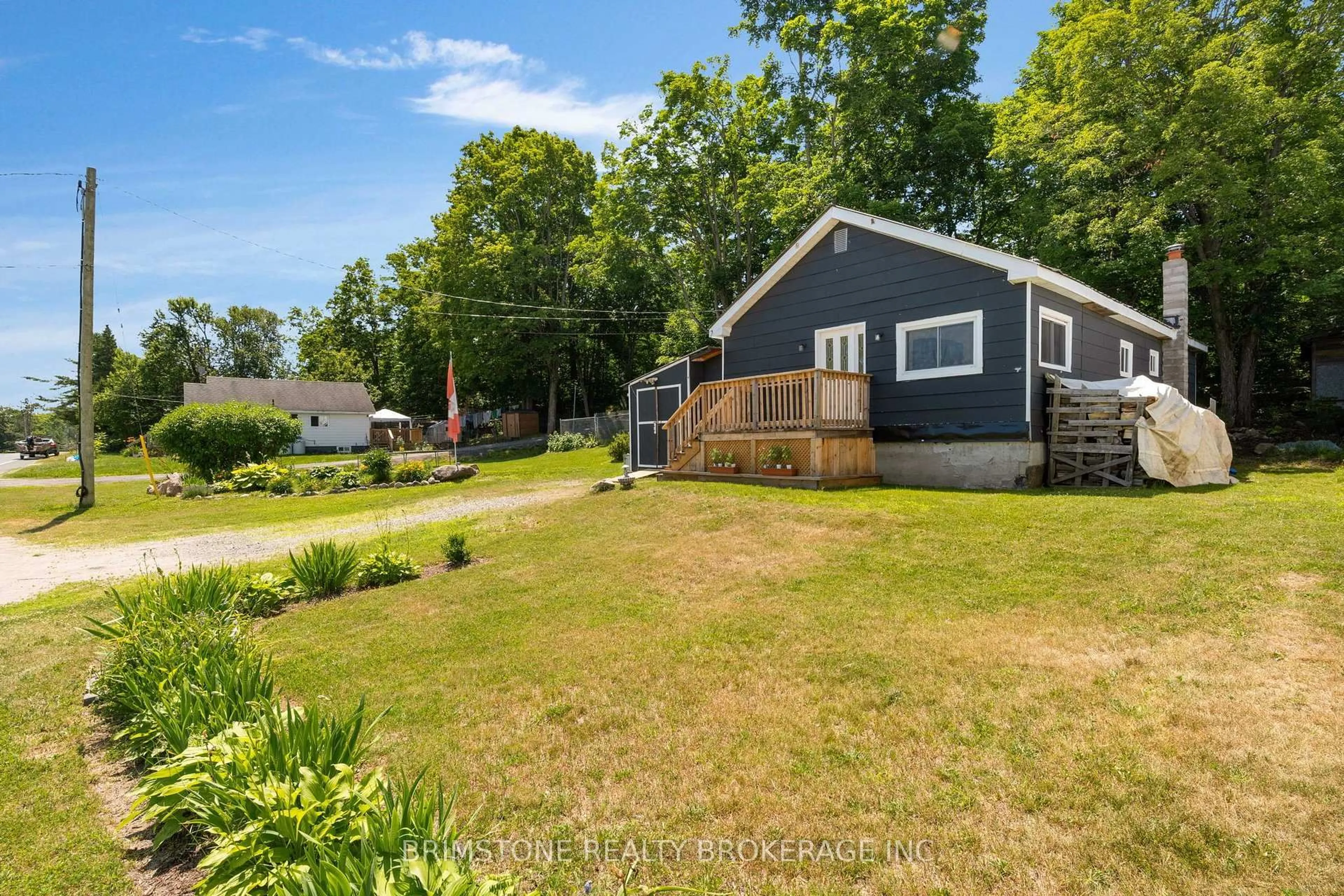 A pic from outside/outdoor area/front of a property/back of a property/a pic from drone, water/lake/river/ocean view for 329 High St, Georgian Bay Ontario P0C 1H0