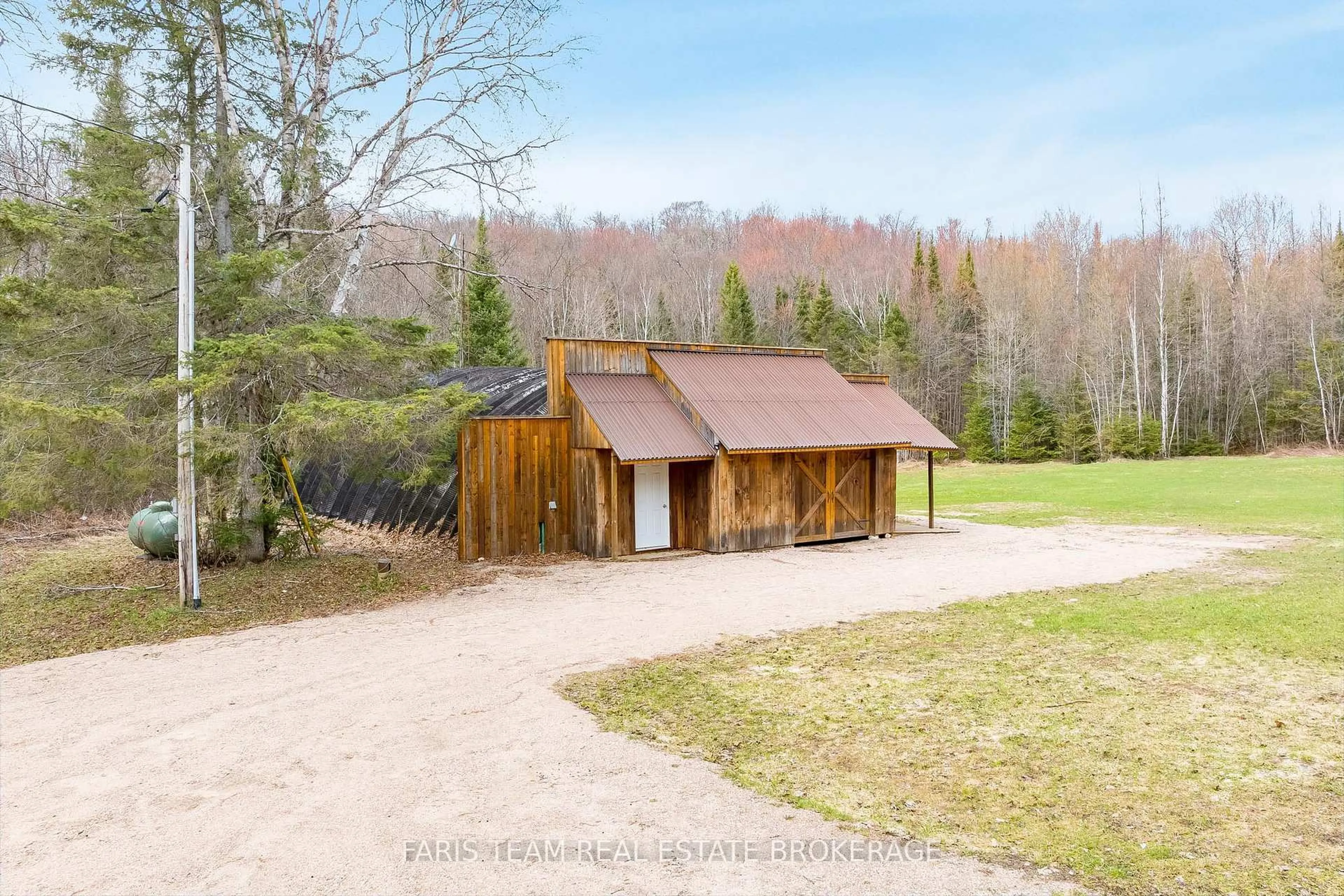 A pic from outside/outdoor area/front of a property/back of a property/a pic from drone, unknown for 376 Riding Ranch Rd, South River Ontario P0A 1X0