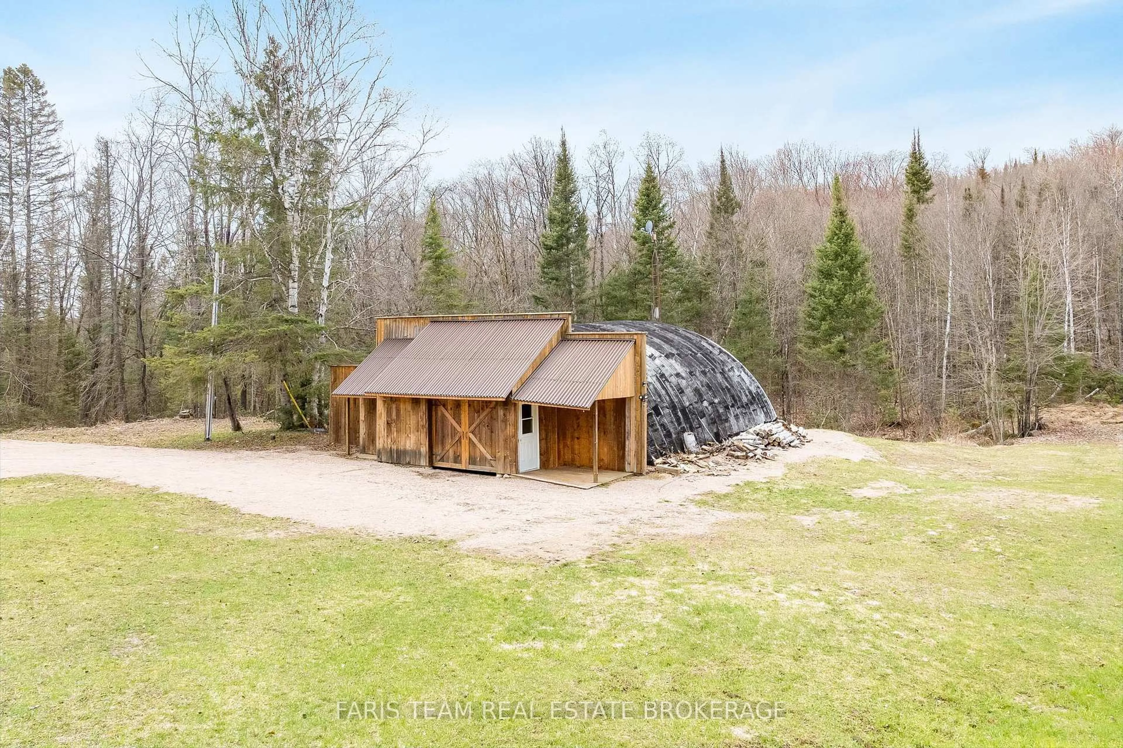 A pic from outside/outdoor area/front of a property/back of a property/a pic from drone, building for 376 Riding Ranch Rd, South River Ontario P0A 1X0