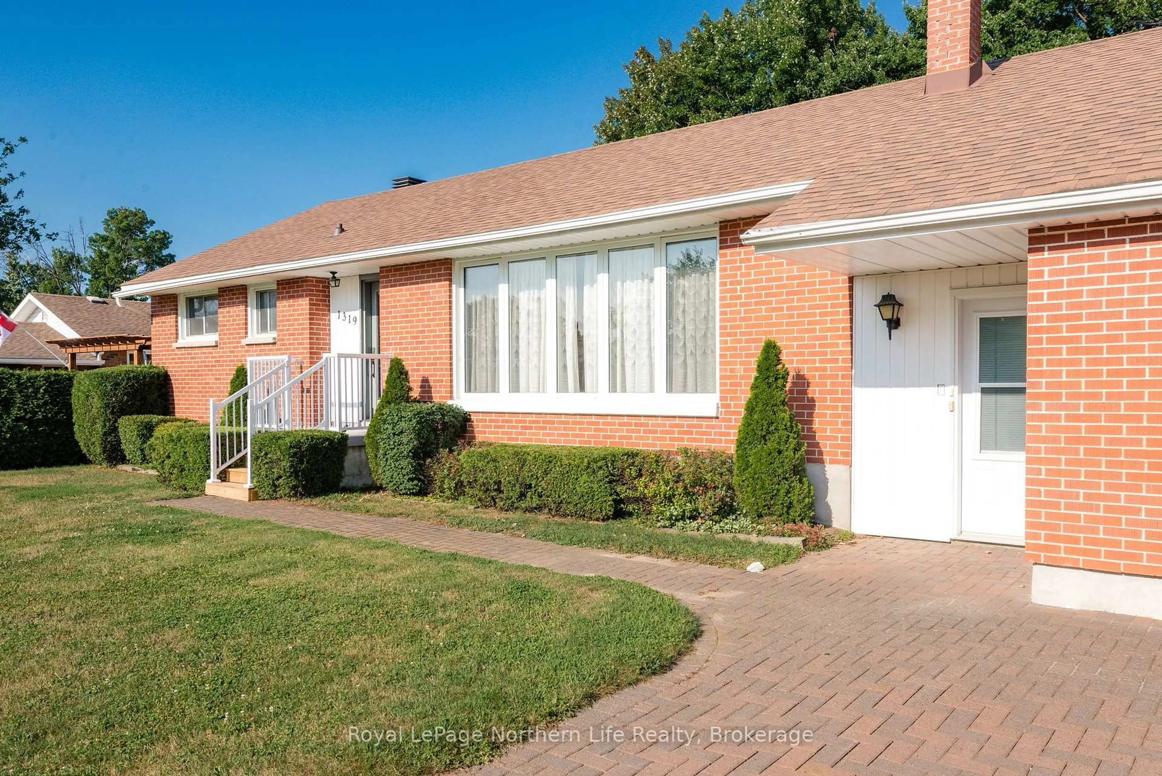 Home with brick exterior material, street for 1319 Clarence St, North Bay Ontario P1B 3W6