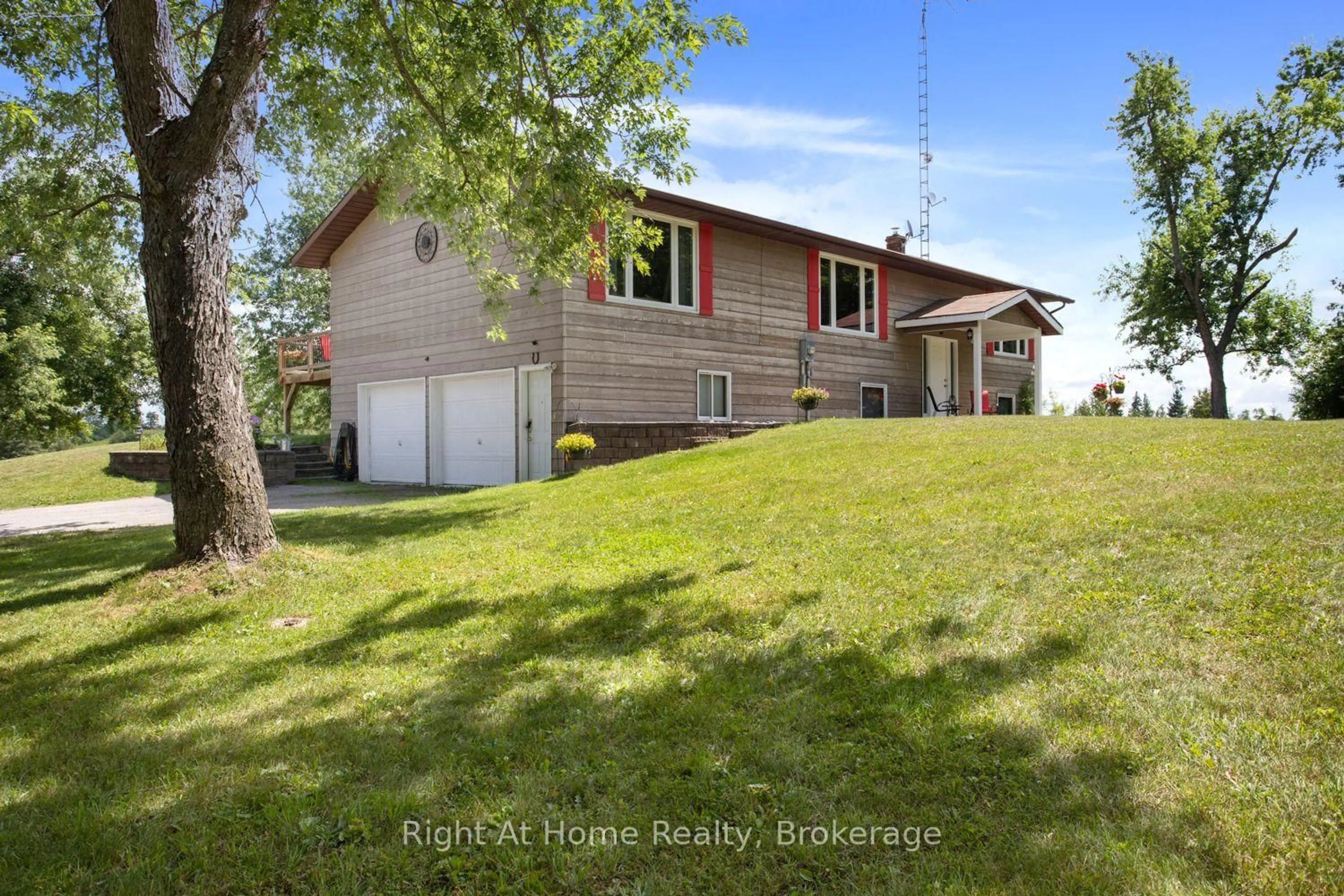A pic from outside/outdoor area/front of a property/back of a property/a pic from drone, water/lake/river/ocean view for 34 Birch Point Rd, Kawartha Lakes Ontario K0M 1L0