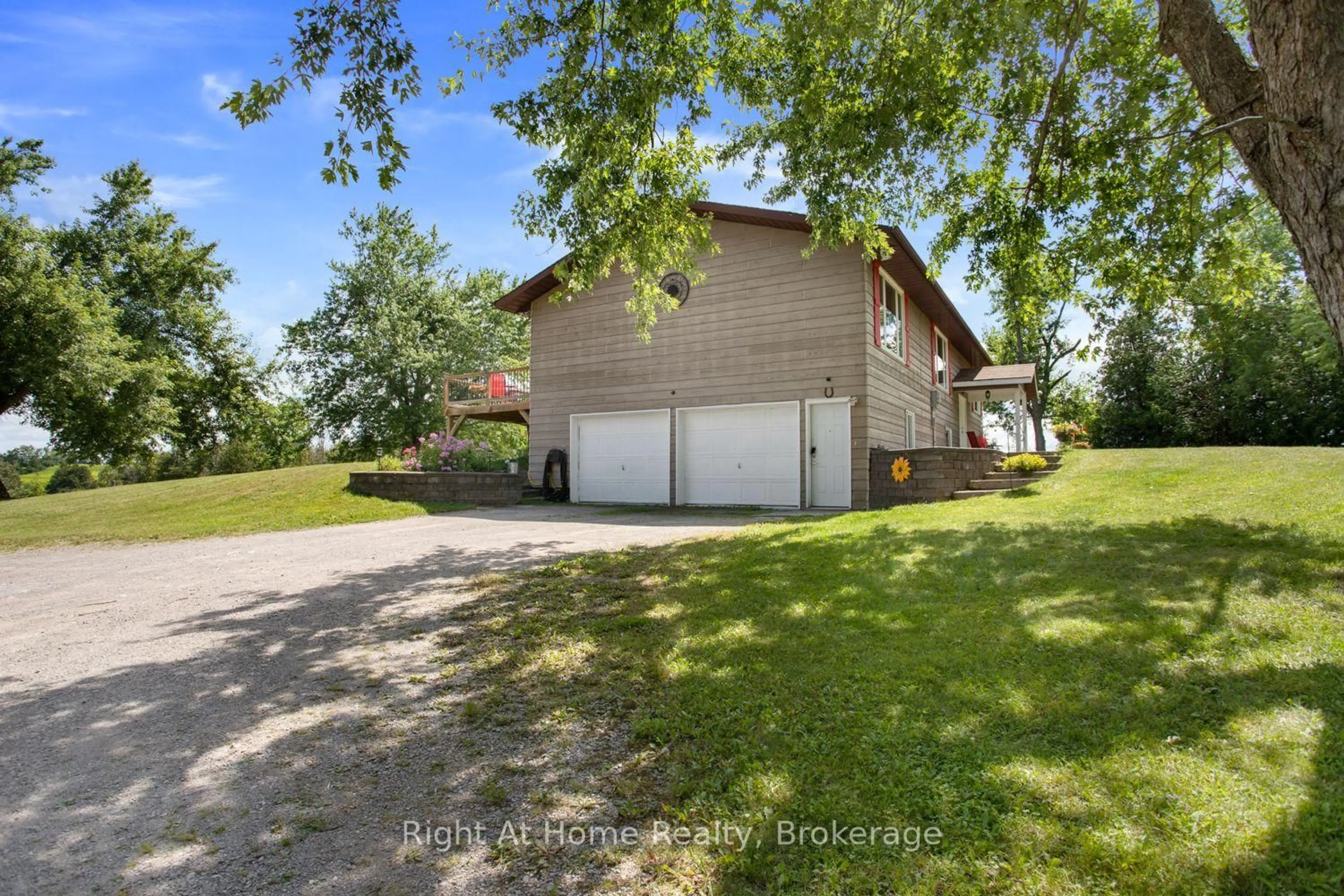 A pic from outside/outdoor area/front of a property/back of a property/a pic from drone, unknown for 34 Birch Point Rd, Kawartha Lakes Ontario K0M 1L0