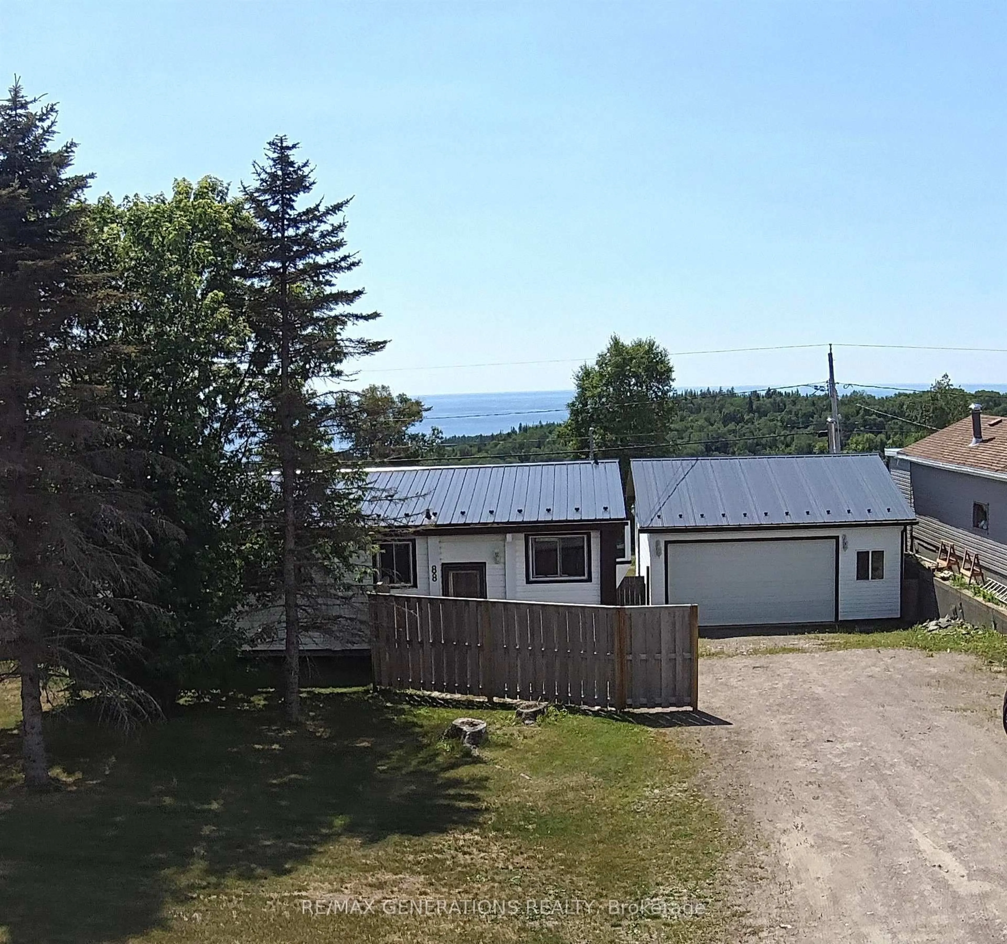 A pic from outside/outdoor area/front of a property/back of a property/a pic from drone, water/lake/river/ocean view for 88 Lakeview Dr, Terrace Bay Ontario P0T 2W0