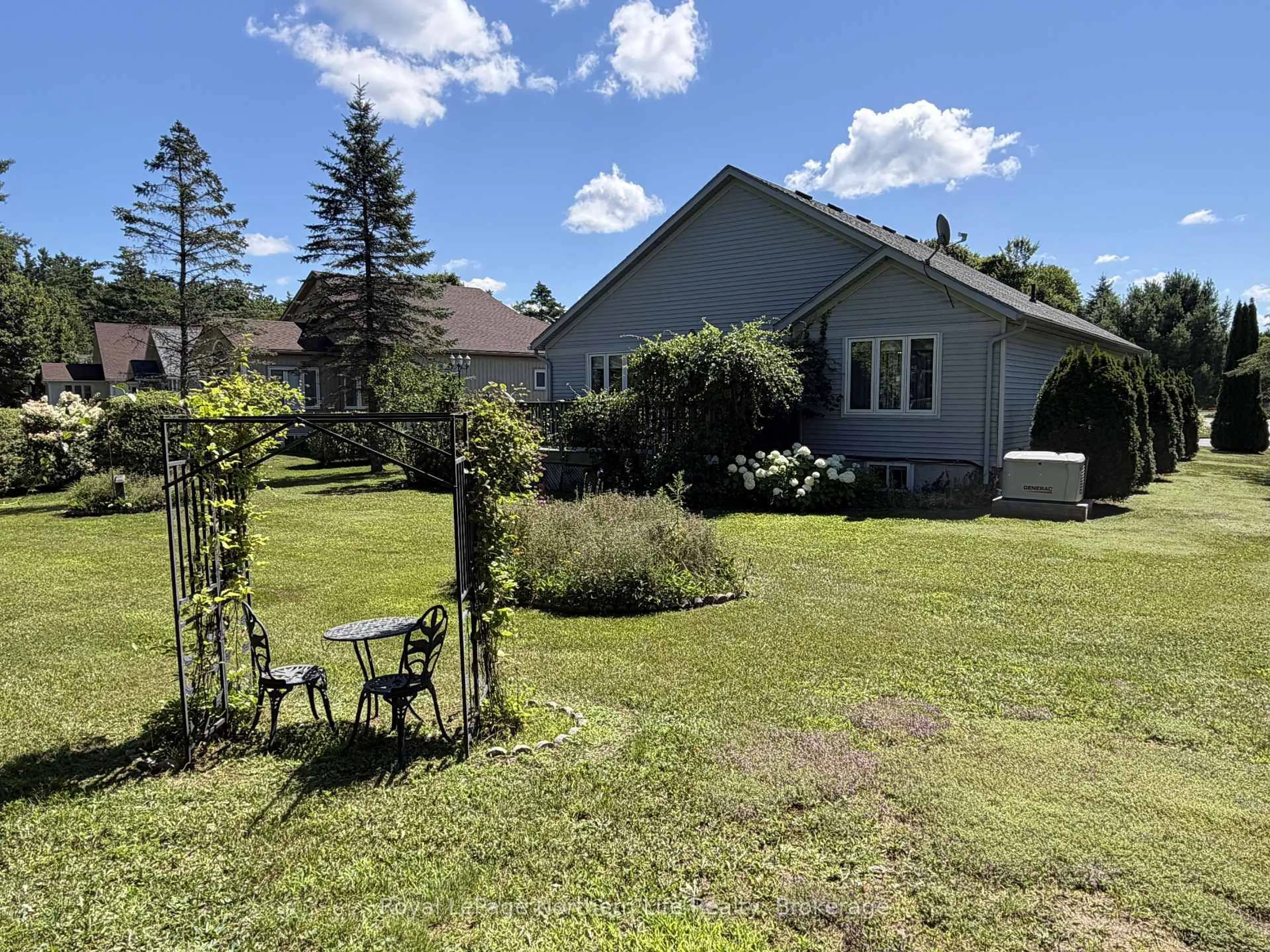 A pic from outside/outdoor area/front of a property/back of a property/a pic from drone, water/lake/river/ocean view for 2 TWIGS End, Gravenhurst Ontario P1P 1Z2