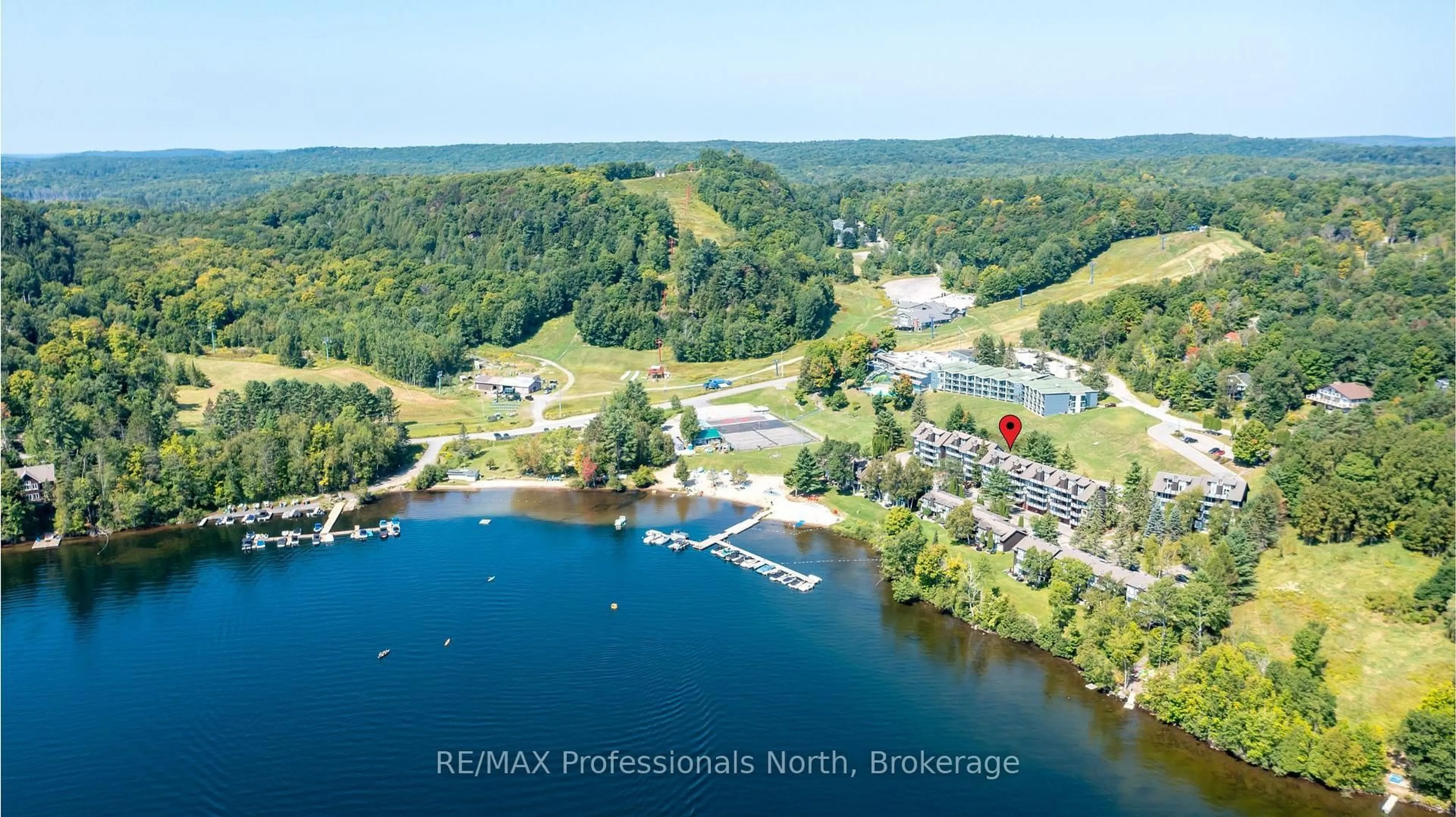 A pic from outside/outdoor area/front of a property/back of a property/a pic from drone, water/lake/river/ocean view for 26 Turner Dr #13, Huntsville Ontario P1H 1A8