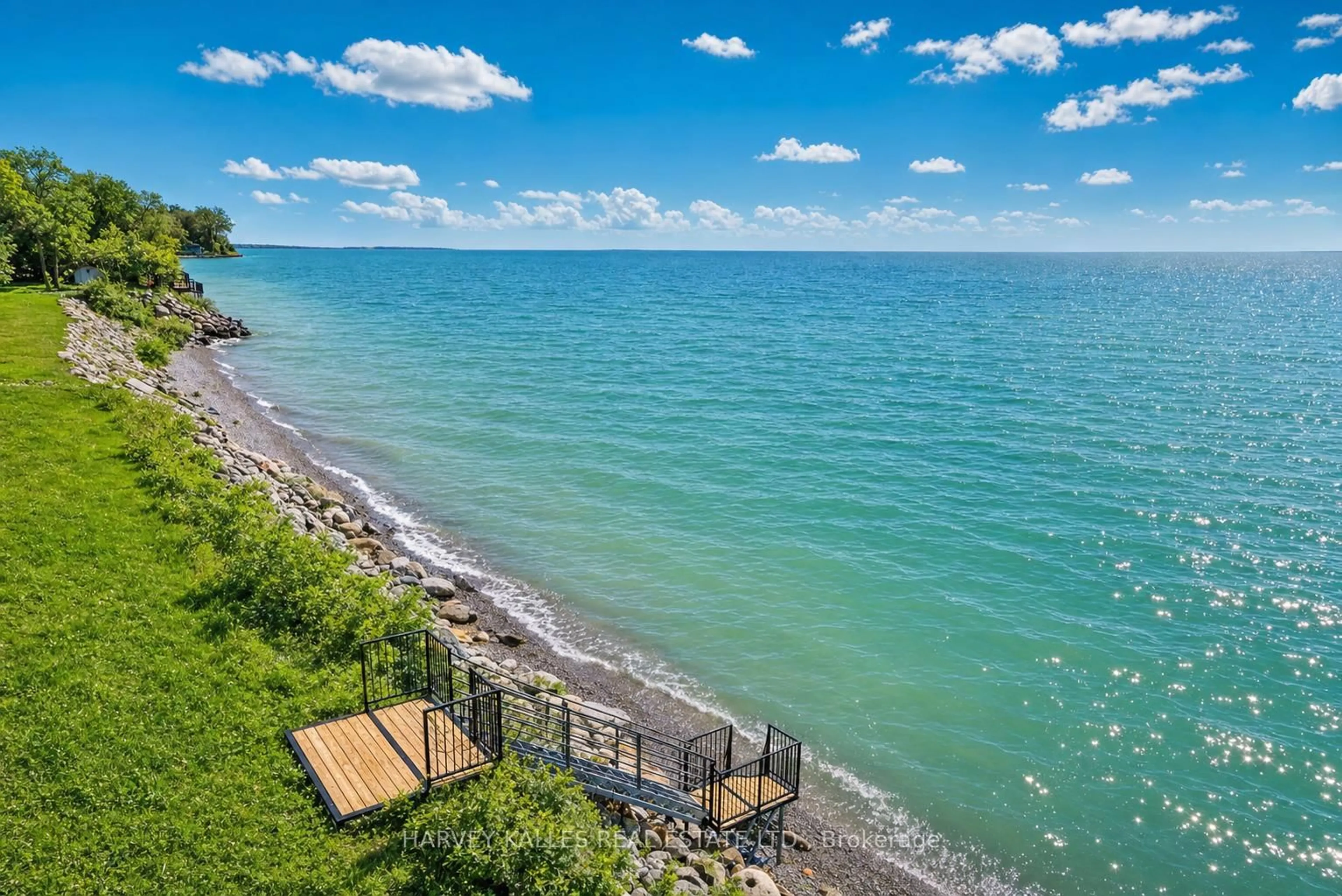 A pic from outside/outdoor area/front of a property/back of a property/a pic from drone, water/lake/river/ocean view for 431 Victoria Beach Rd, Cramahe Ontario K0K 1S0