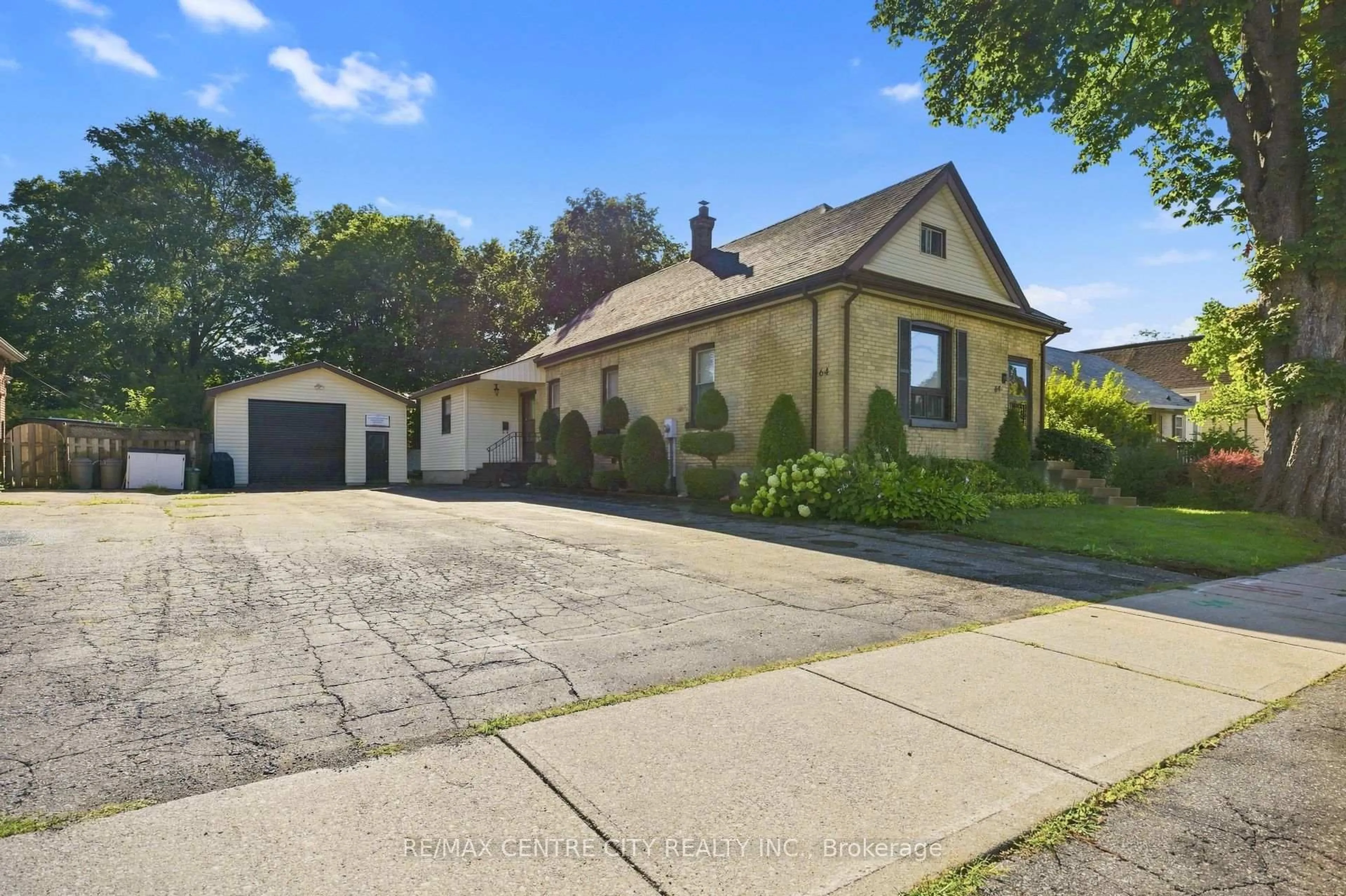 A pic from outside/outdoor area/front of a property/back of a property/a pic from drone, street for 64 Linwood St, London East Ontario N5Y 1W2