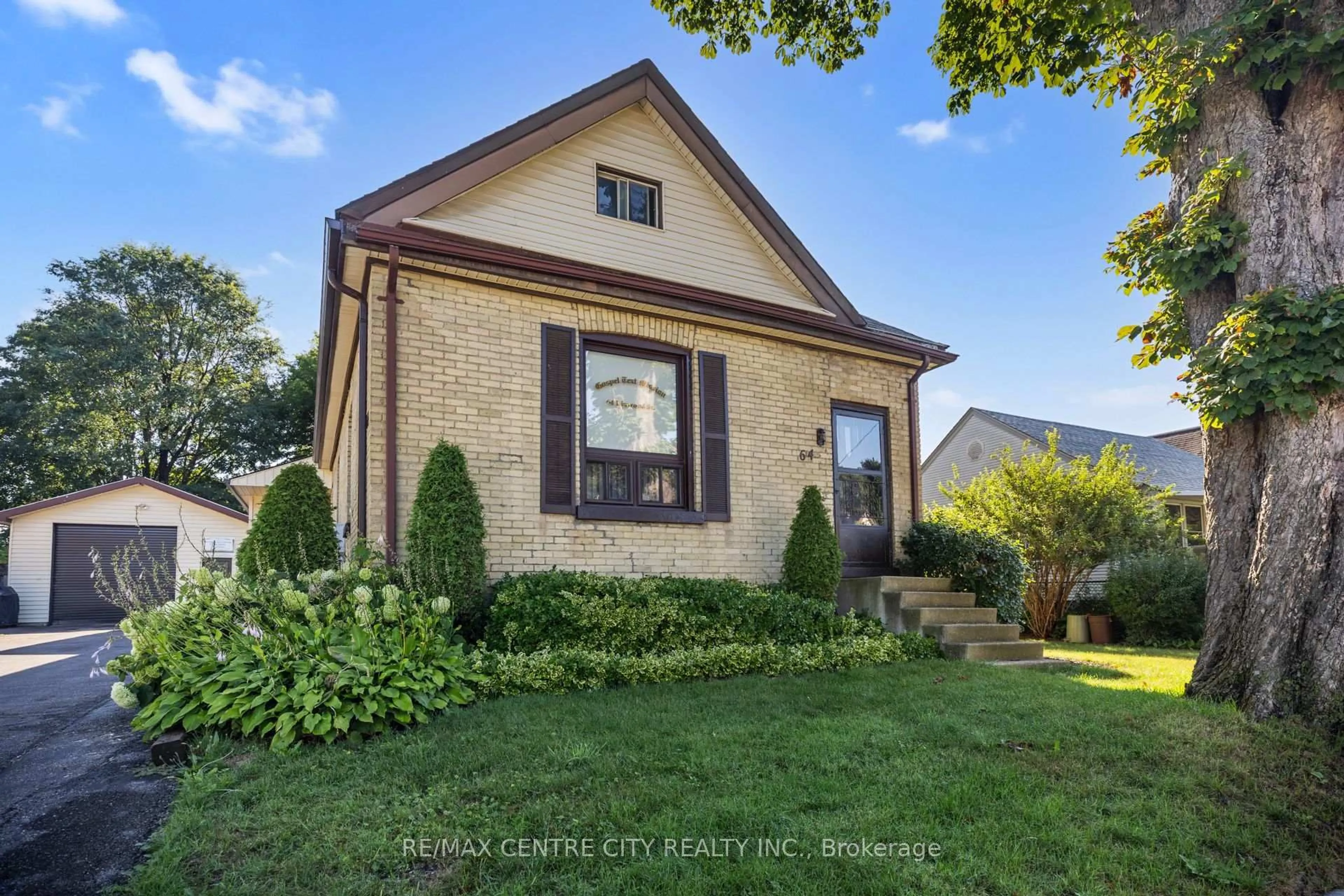 Home with brick exterior material, street for 64 Linwood St, London East Ontario N5Y 1W2