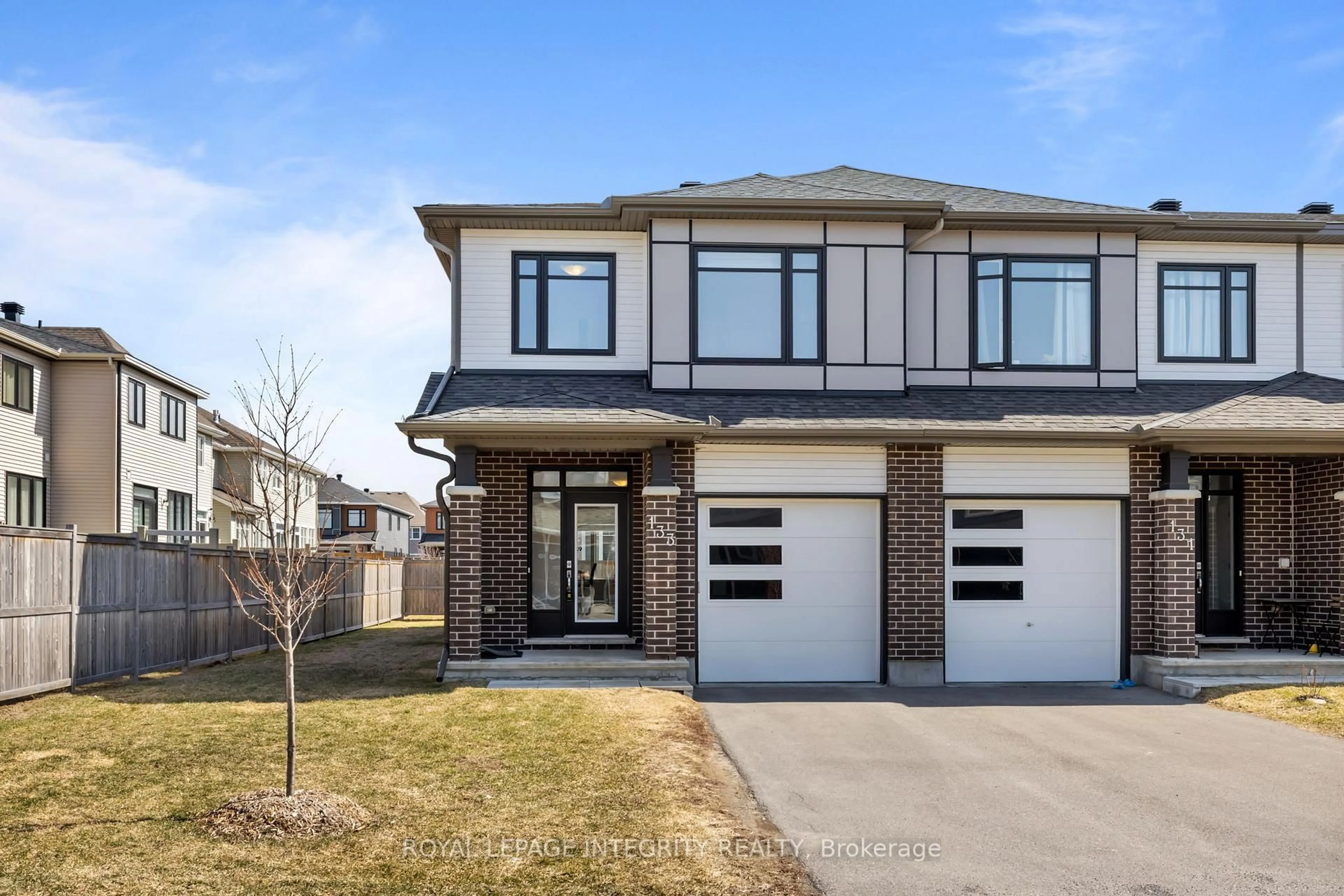 Home with brick exterior material, street for 133 Angelonia Cres, Ottawa Ontario K1T 0Y5