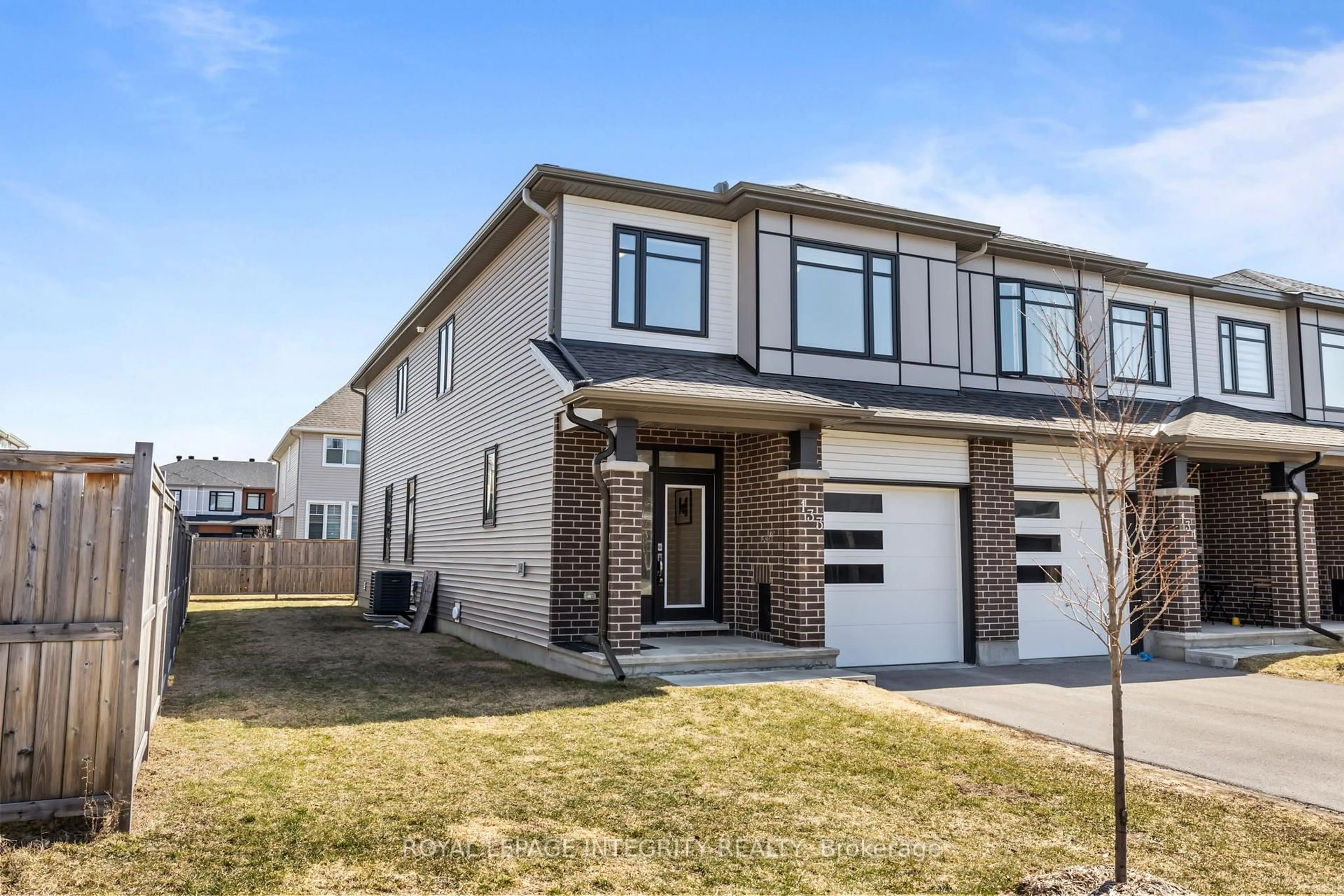 Home with brick exterior material, street for 133 Angelonia Cres, Ottawa Ontario K1T 0Y5