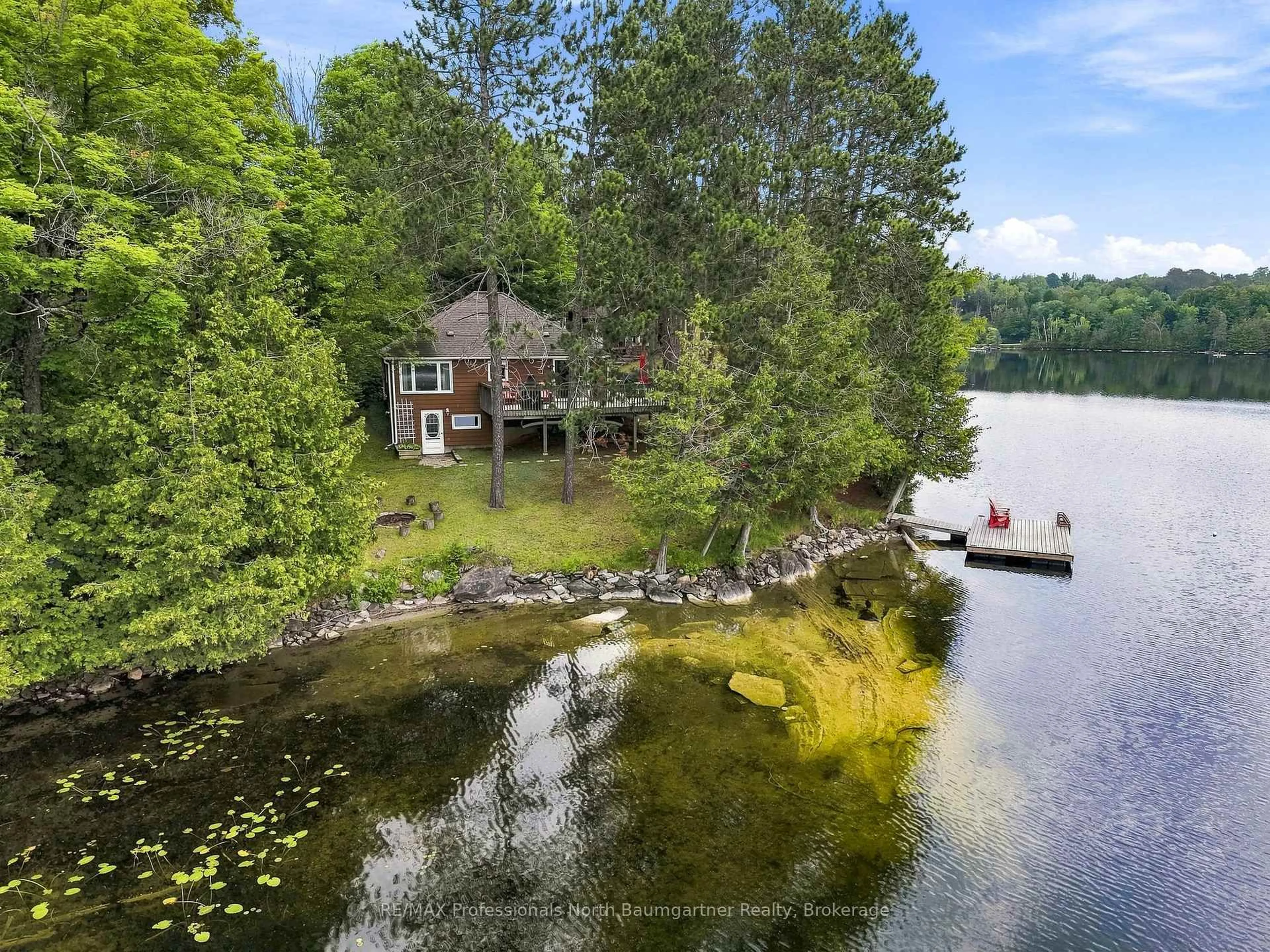 A pic from outside/outdoor area/front of a property/back of a property/a pic from drone, water/lake/river/ocean view for 45 Scott Settlement Rd, North Kawartha Ontario K0L 1A0