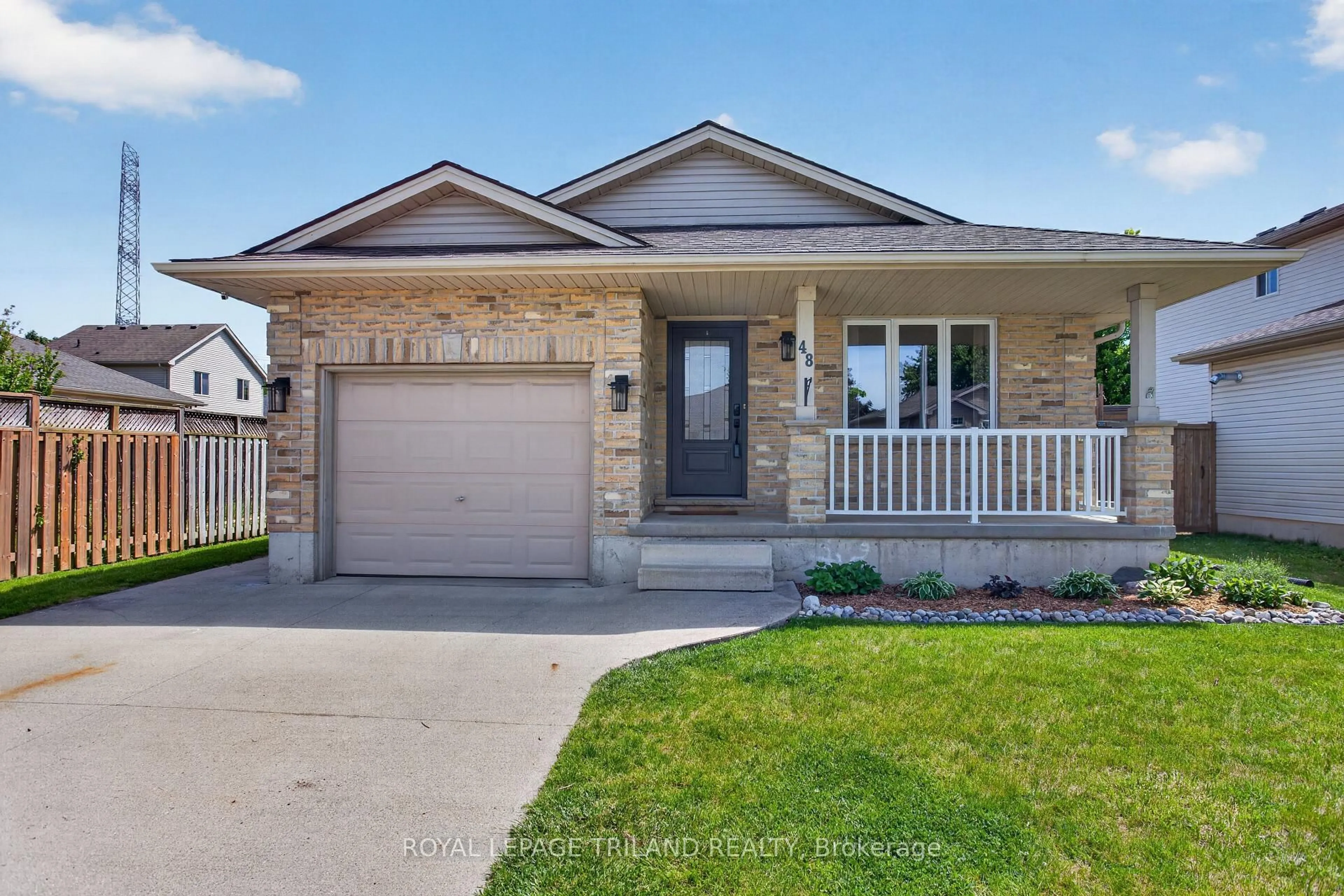 Home with brick exterior material, street for 48 Cottonwood Dr, St. Thomas Ontario N5P 4M7