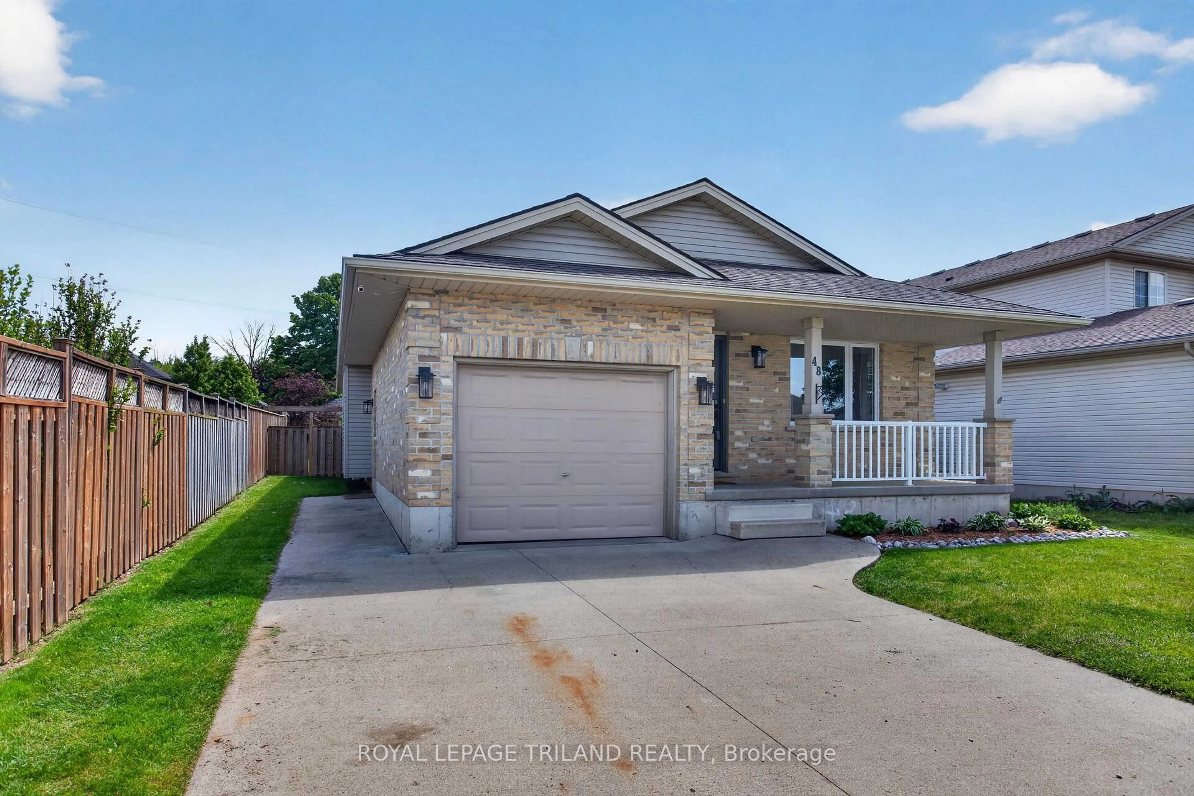 Home with brick exterior material, street for 48 Cottonwood Dr, St. Thomas Ontario N5P 4M7