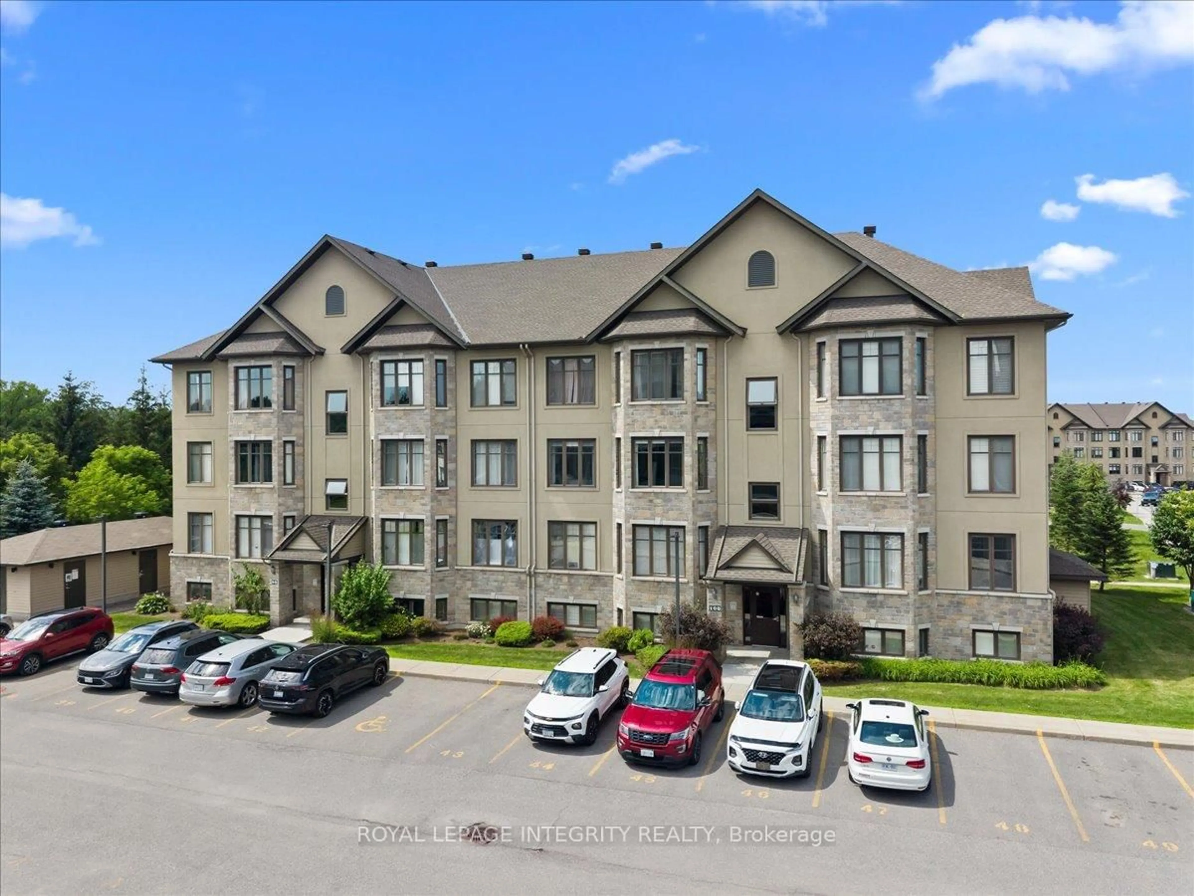 A pic from outside/outdoor area/front of a property/back of a property/a pic from drone, building for 100 Prestige Circ #5, Ottawa Ontario K4A 0Y1