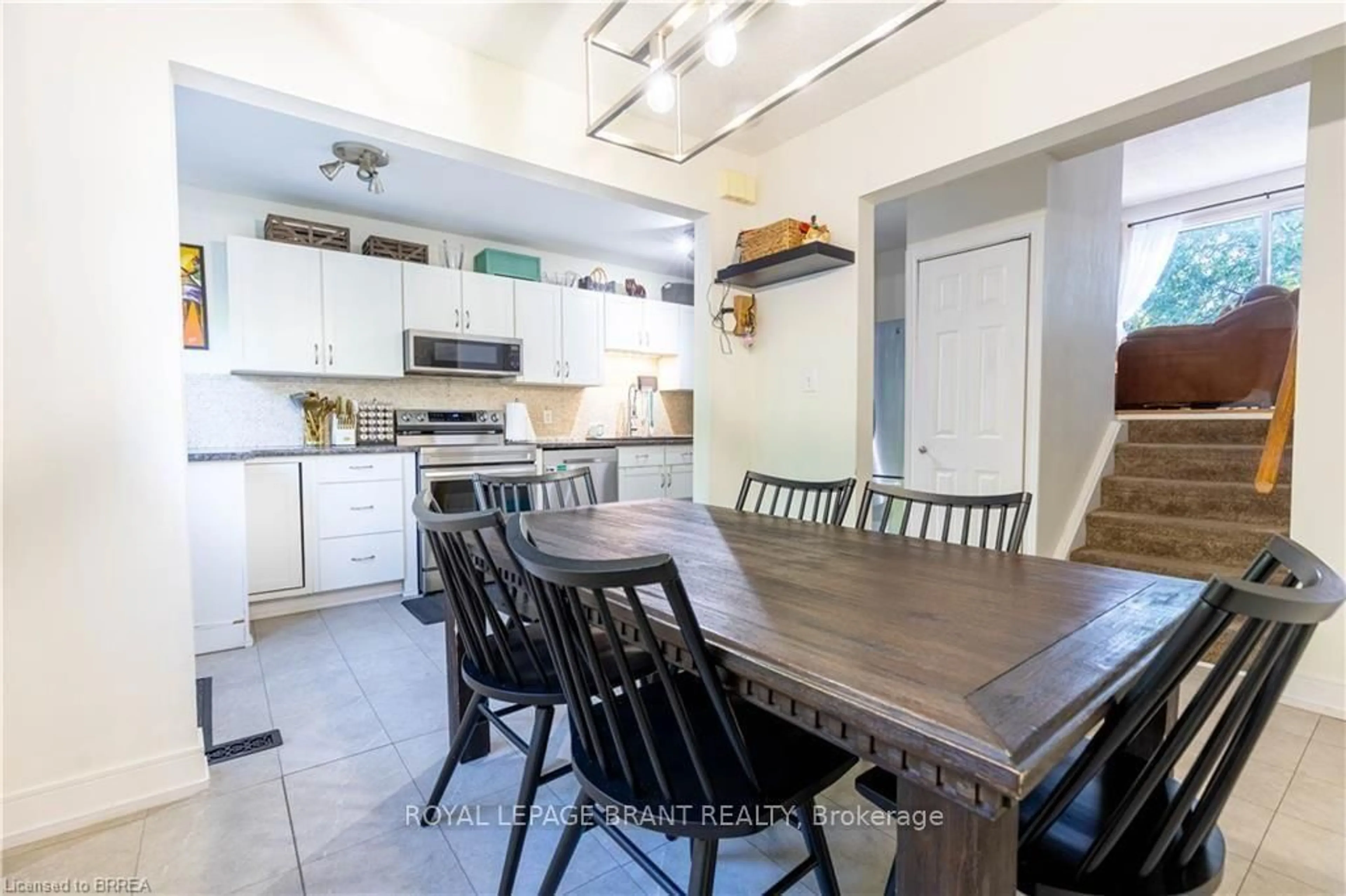 Open concept kitchen, ceramic/tile floor for 500 Stone Church Rd #E5, Hamilton Ontario L9B 1R2