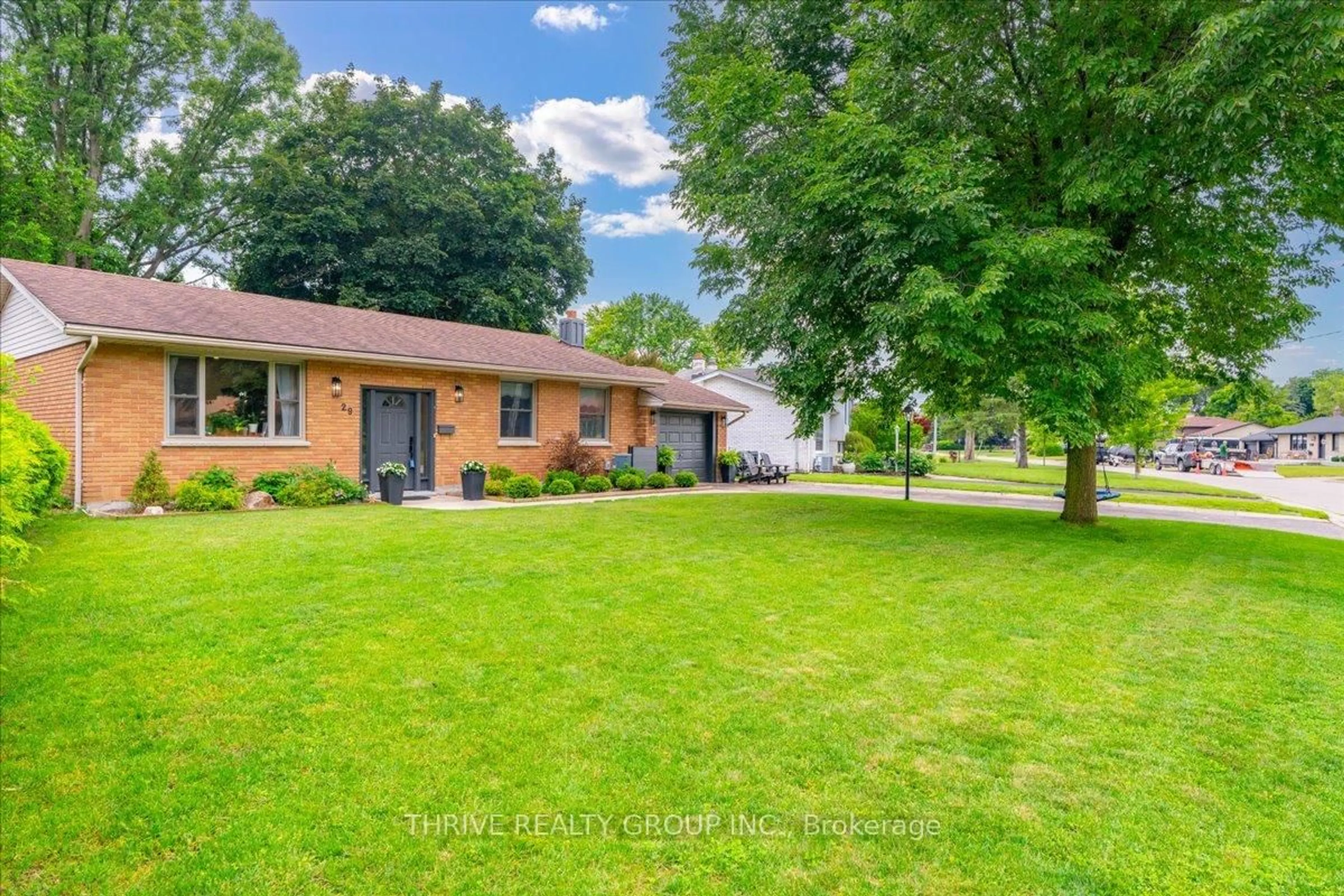 A pic from outside/outdoor area/front of a property/back of a property/a pic from drone, street for 29 Southland Dr, London South Ontario N6P 1E5