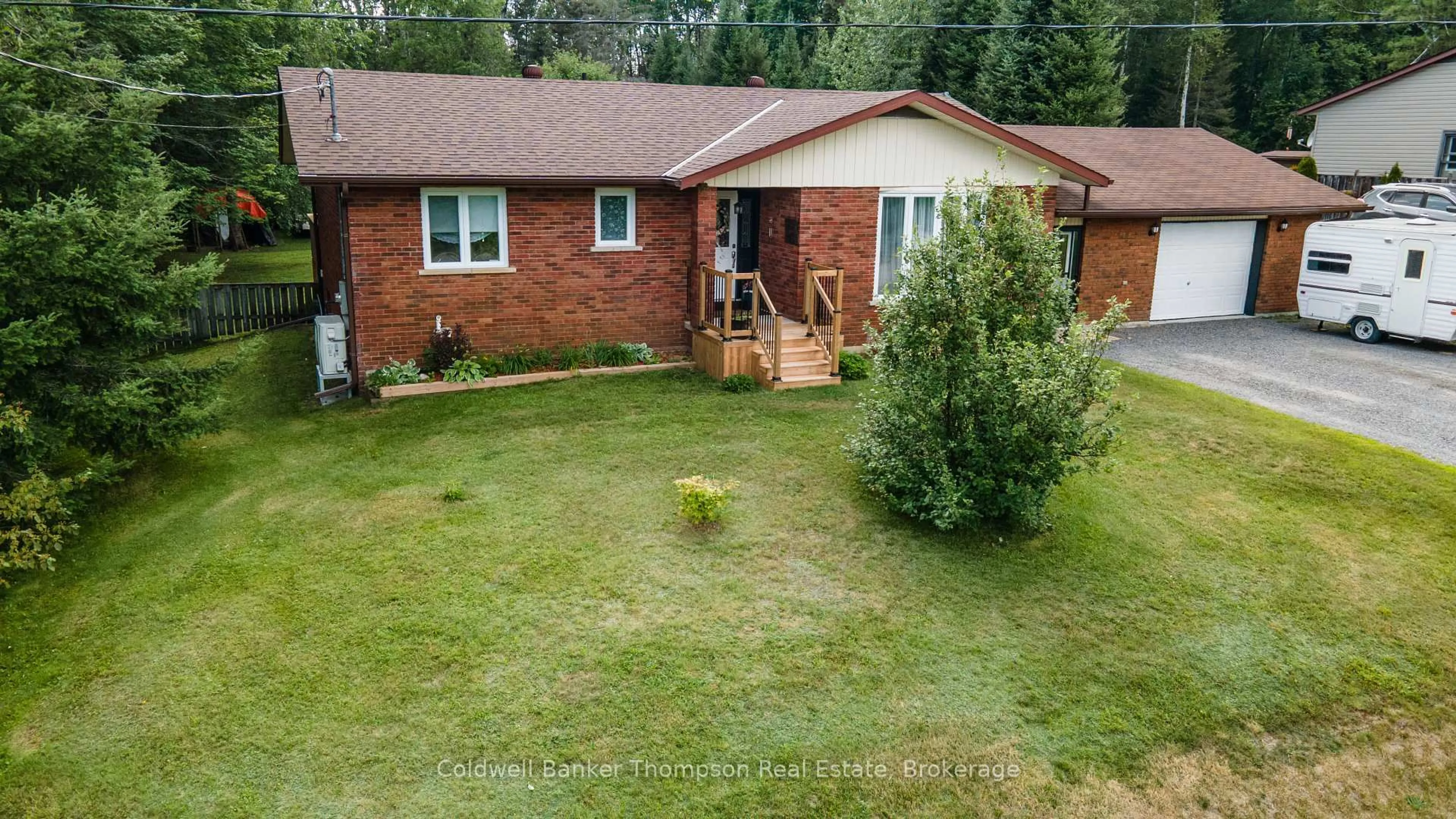 A pic from outside/outdoor area/front of a property/back of a property/a pic from drone, unknown for 5 Grant Crt, South River Ontario P0A 1X0