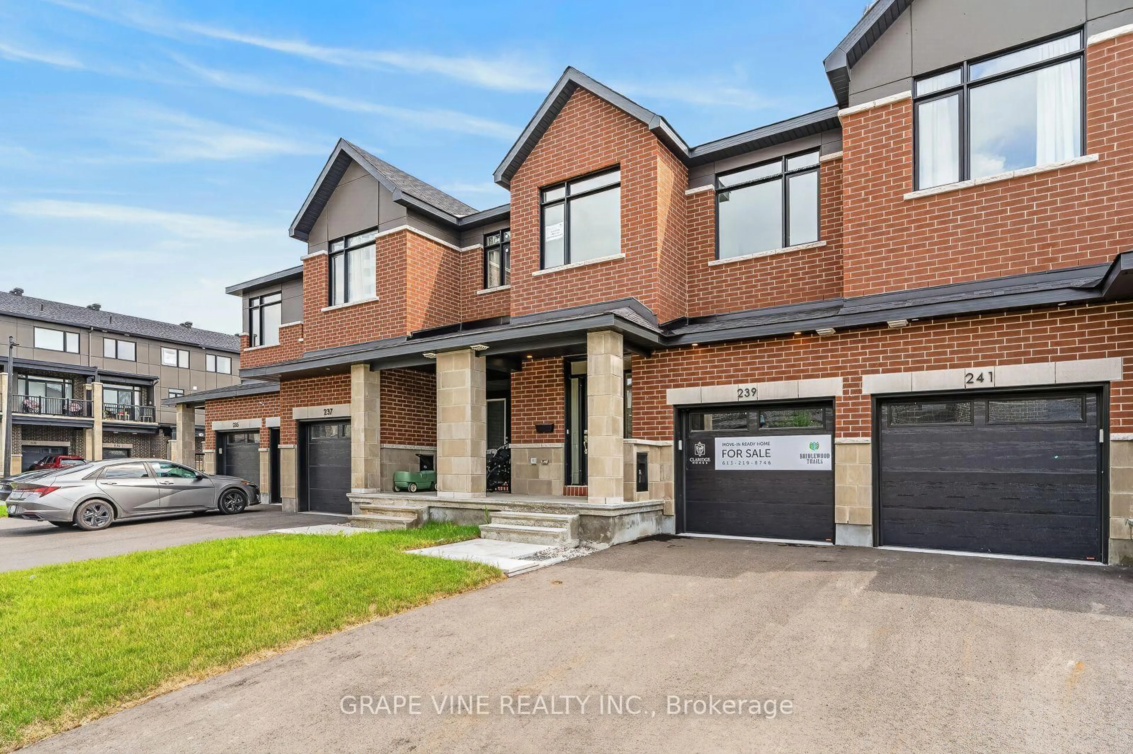 Home with brick exterior material, street for 239 Monticello Ave, Stittsville Ontario K2S 2R8