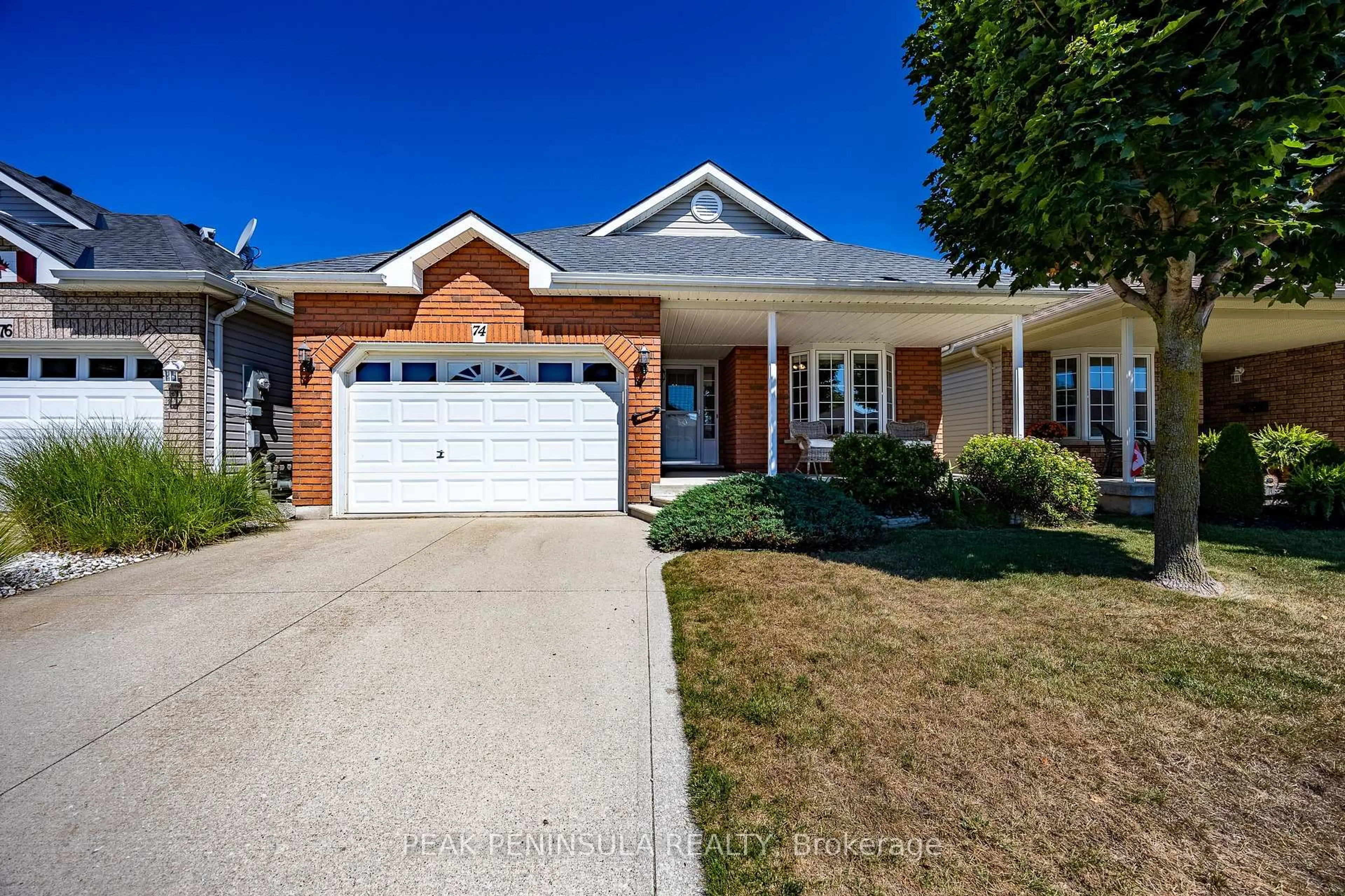 Home with brick exterior material, street for 74 Balsam Tr, Norfolk Ontario N0E 1M0