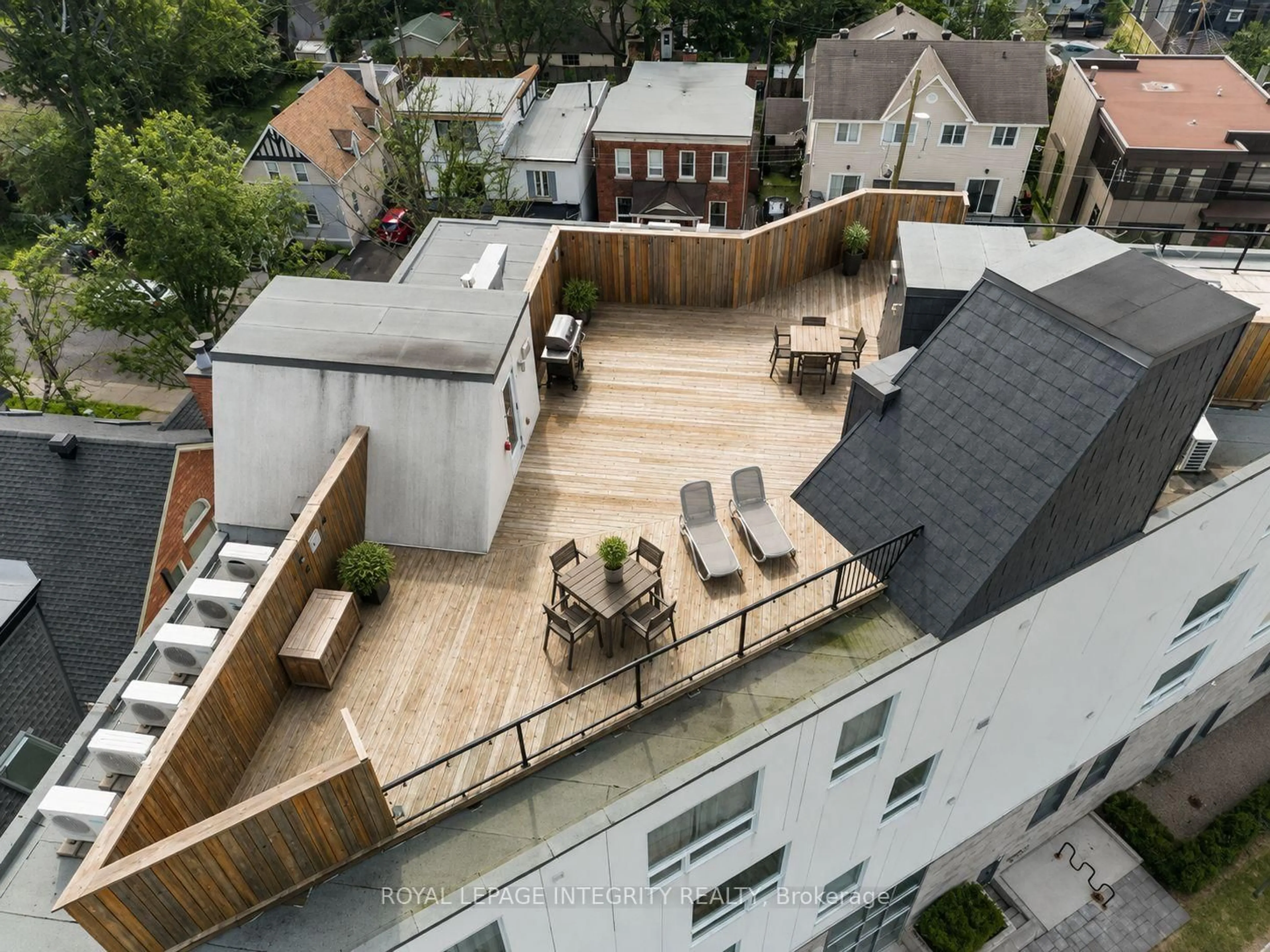 Patio, city buildings view from balcony for 150 Greenfield Ave #204, Ottawa Ontario K1S 0X8