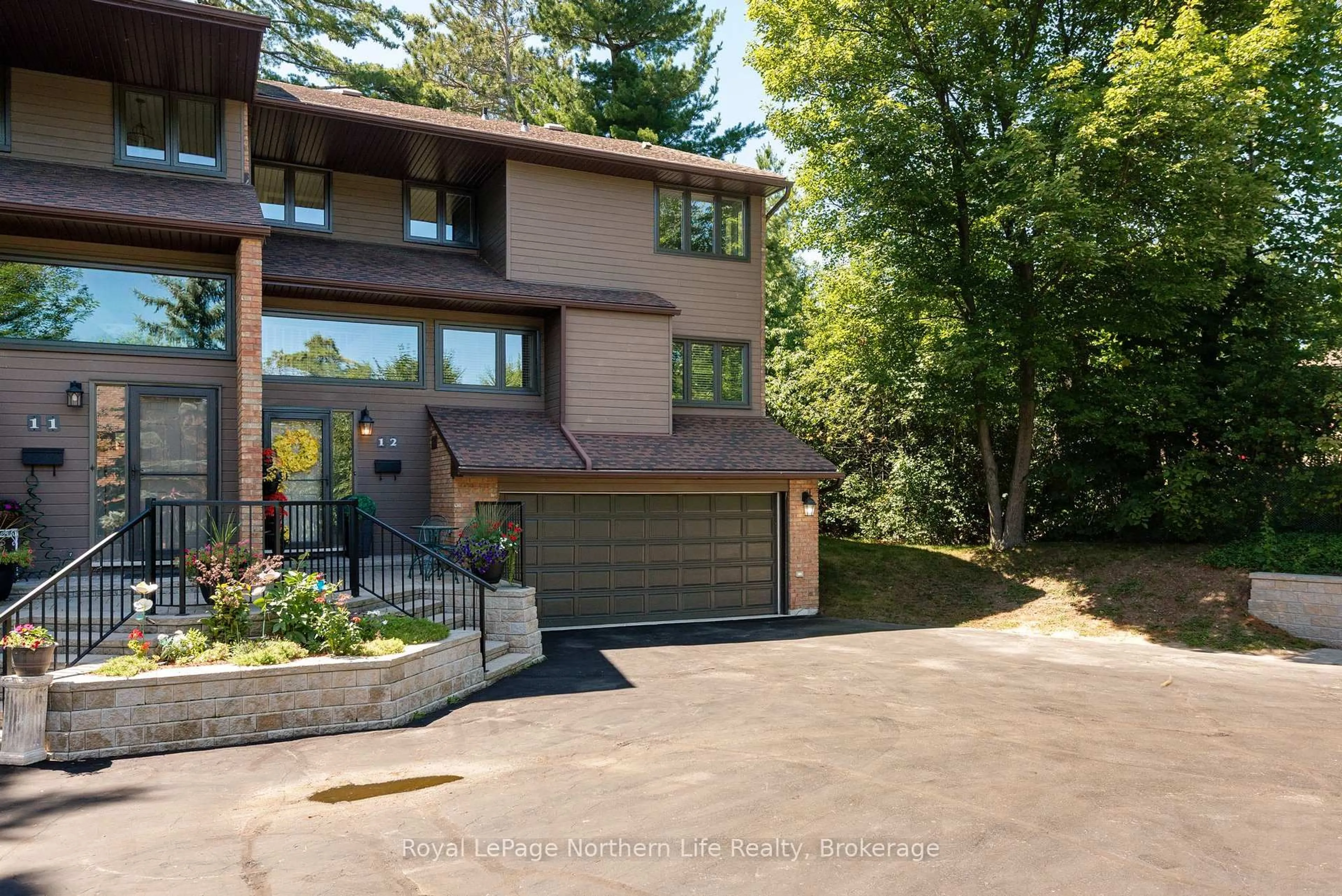 Home with brick exterior material, street for 555 Main St #12, Callander Ontario P0H 1H0