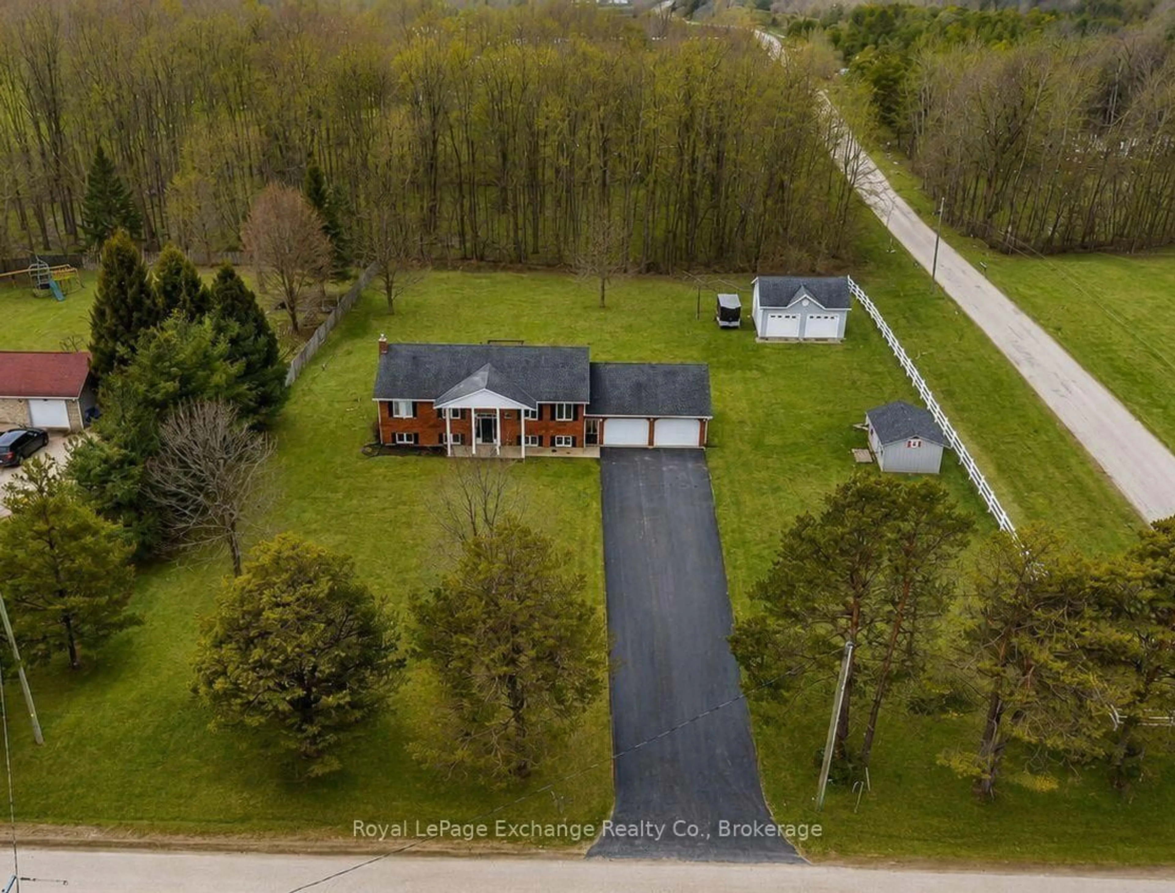 A pic from outside/outdoor area/front of a property/back of a property/a pic from drone, street for 393460 2 Concession, West Grey Ontario N0G 1R0