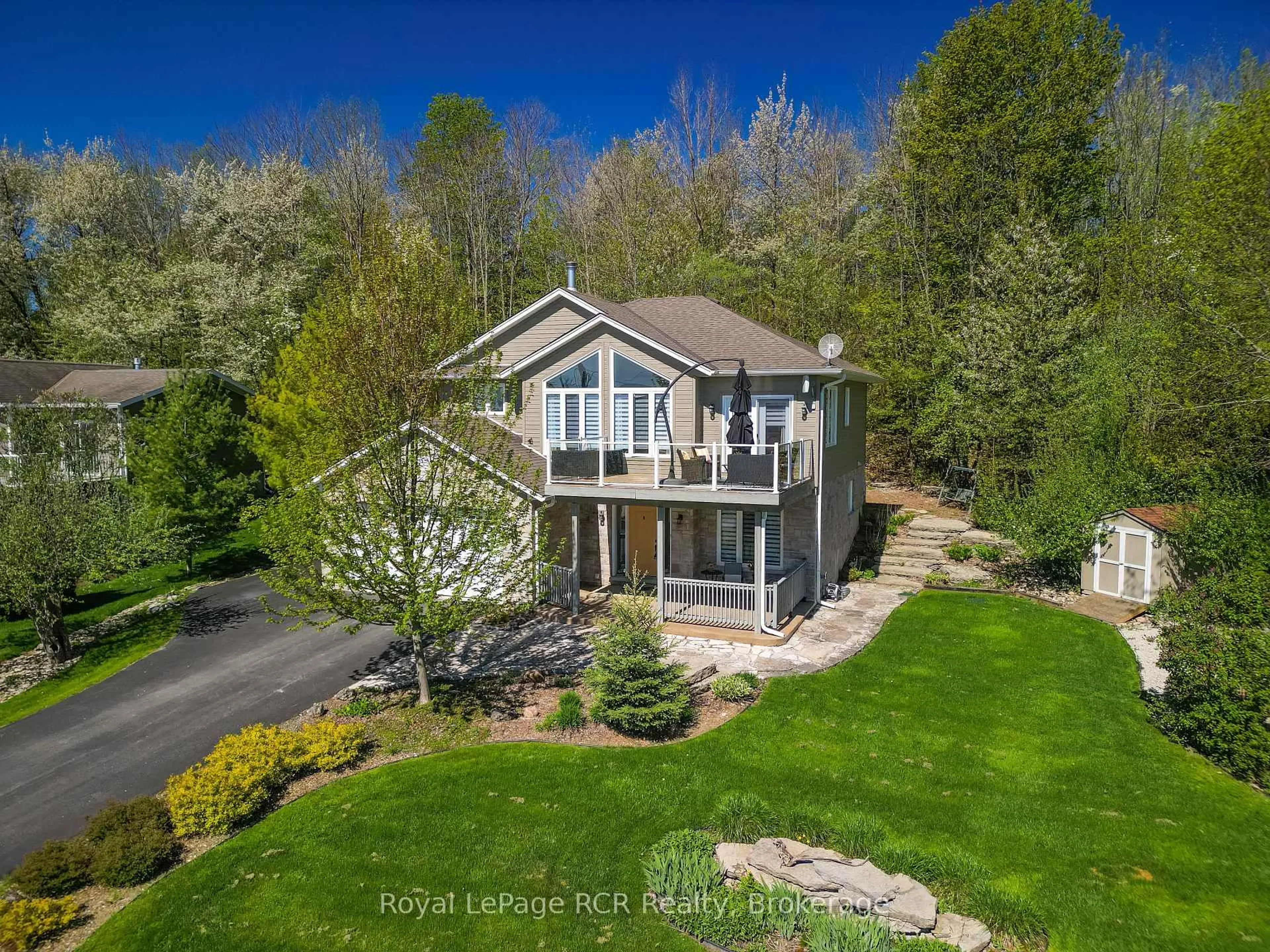 A pic from outside/outdoor area/front of a property/back of a property/a pic from drone, water/lake/river/ocean view for 154 MacIntosh Dr, Georgian Bluffs Ontario N0H 1S0