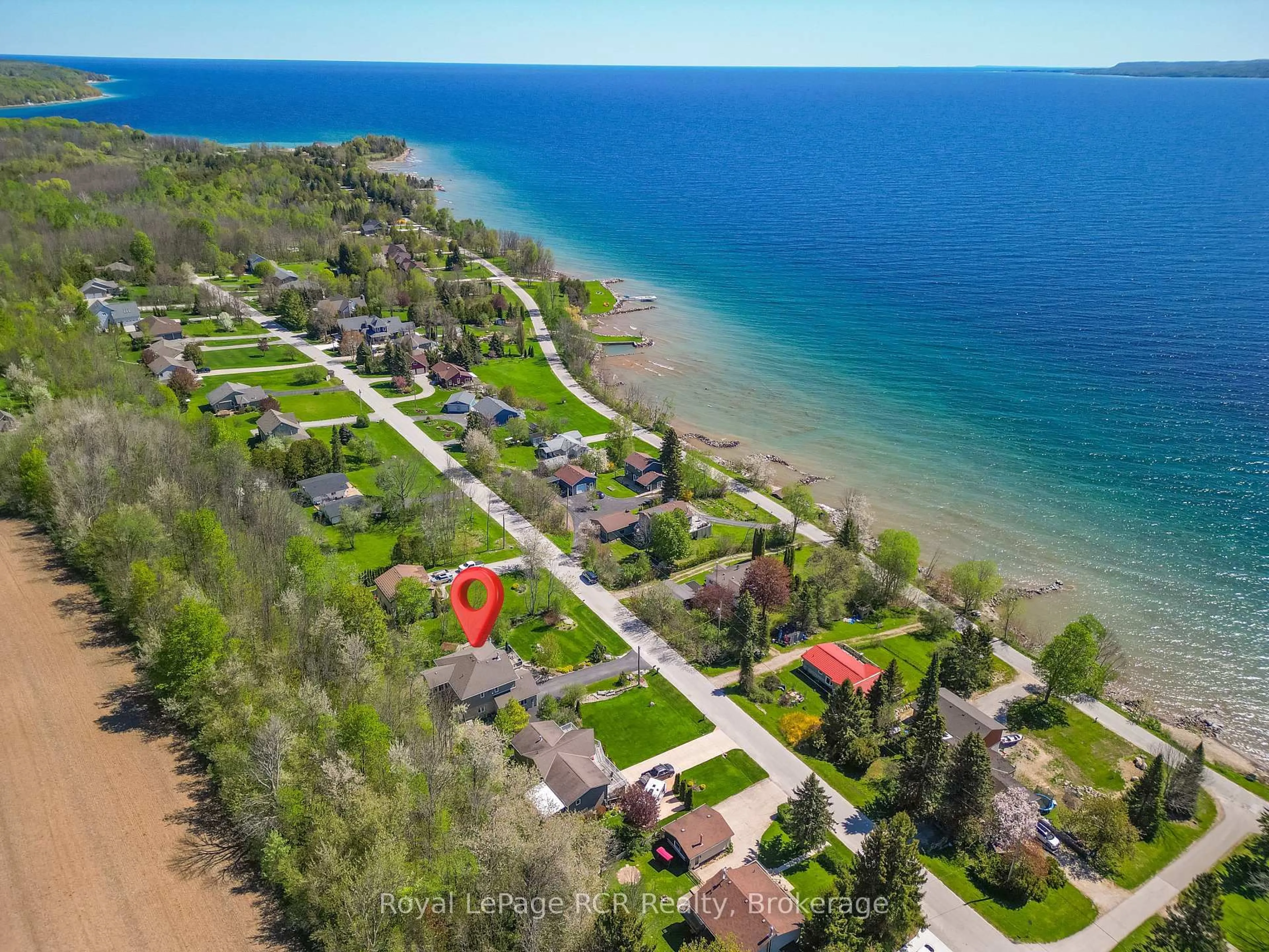 A pic from outside/outdoor area/front of a property/back of a property/a pic from drone, water/lake/river/ocean view for 154 MacIntosh Dr, Georgian Bluffs Ontario N0H 1S0