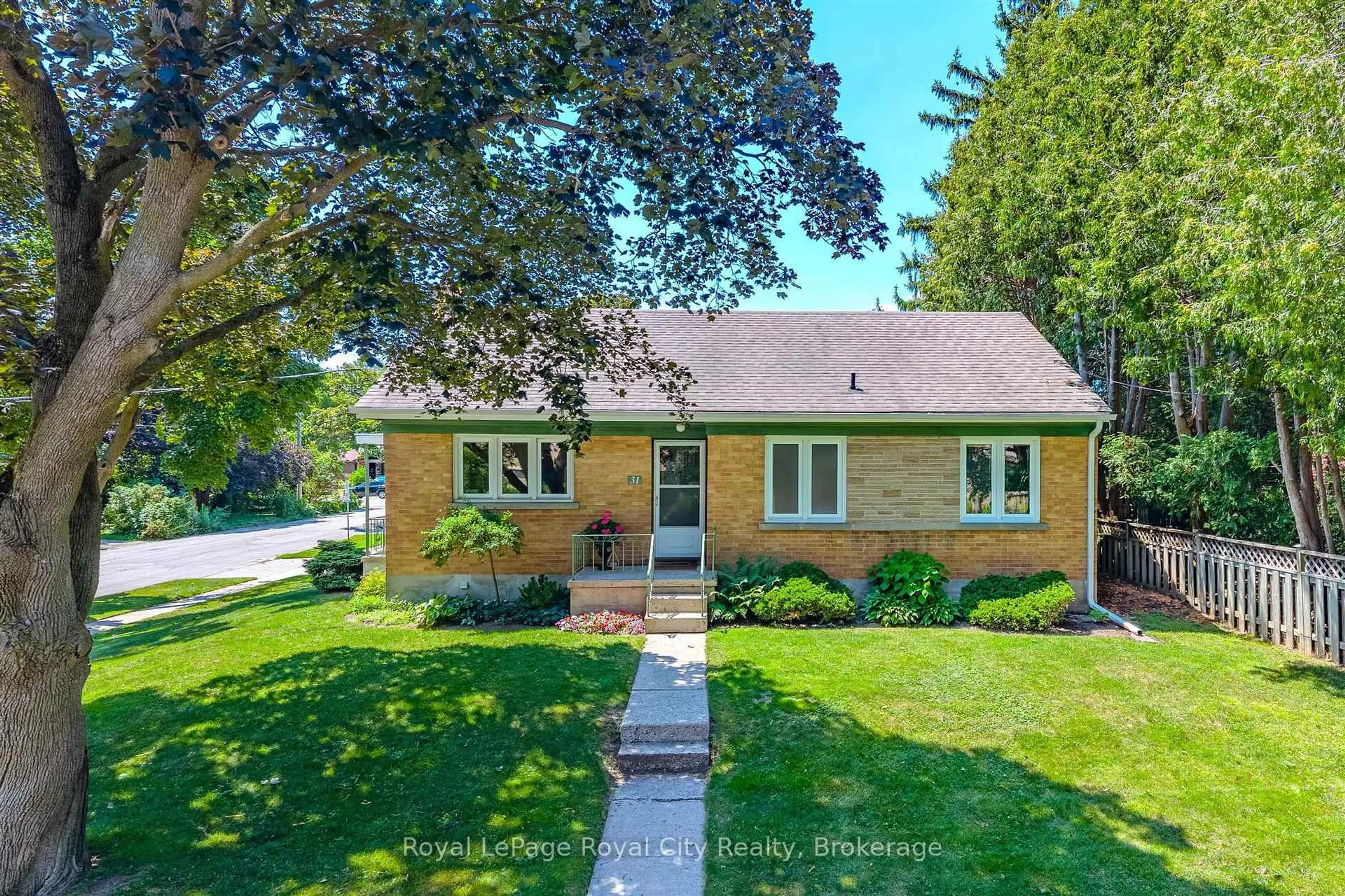 Home with brick exterior material, street for 31 Torrance Cres, Guelph Ontario N1H 1T5