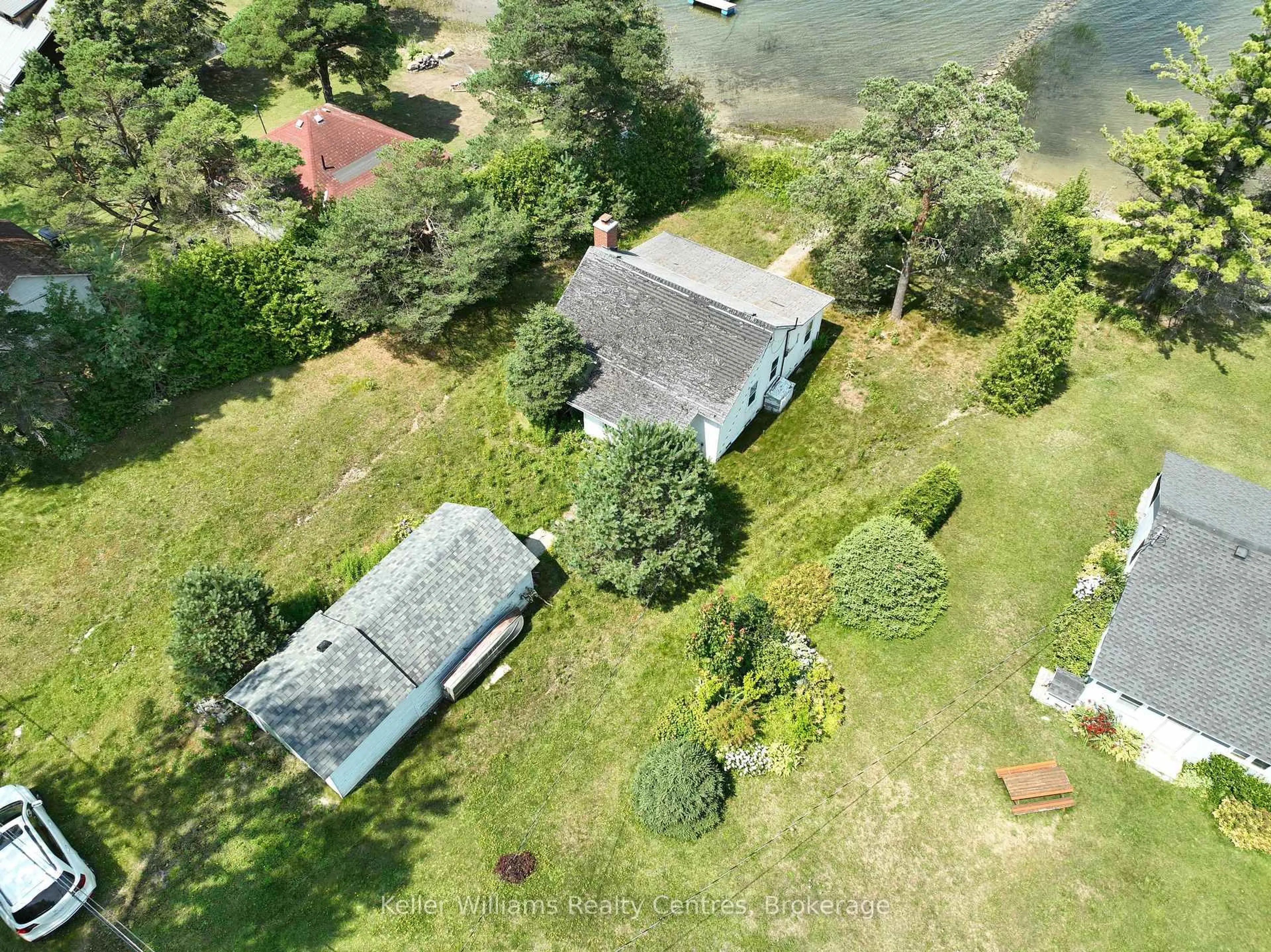 A pic from outside/outdoor area/front of a property/back of a property/a pic from drone, water/lake/river/ocean view for 828 Pike Bay Rd, Northern Bruce Peninsula Ontario N0H 2T0
