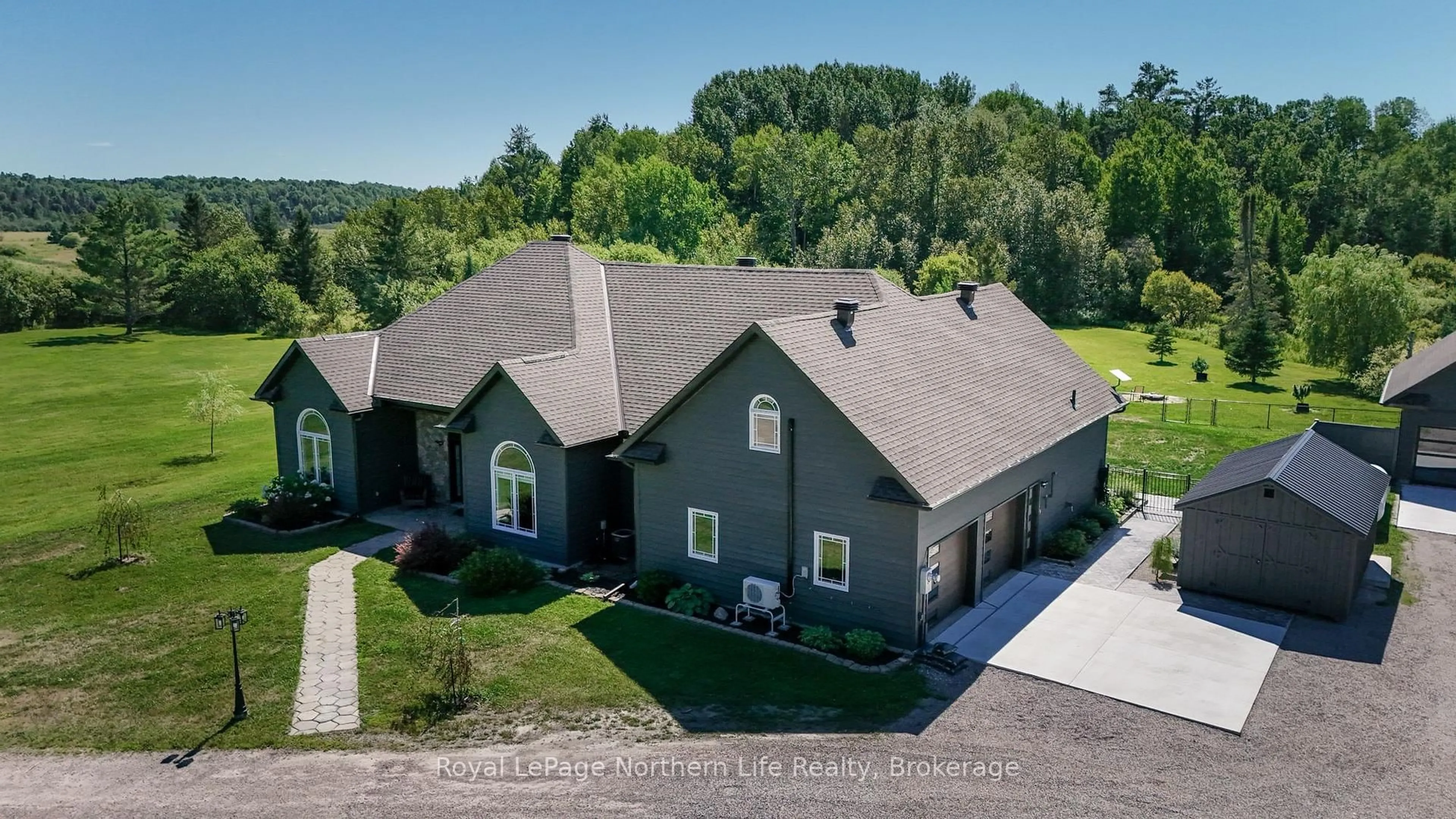 A pic from outside/outdoor area/front of a property/back of a property/a pic from drone, unknown for 59 Wookey Rd, Callander Ontario P0H 1H0