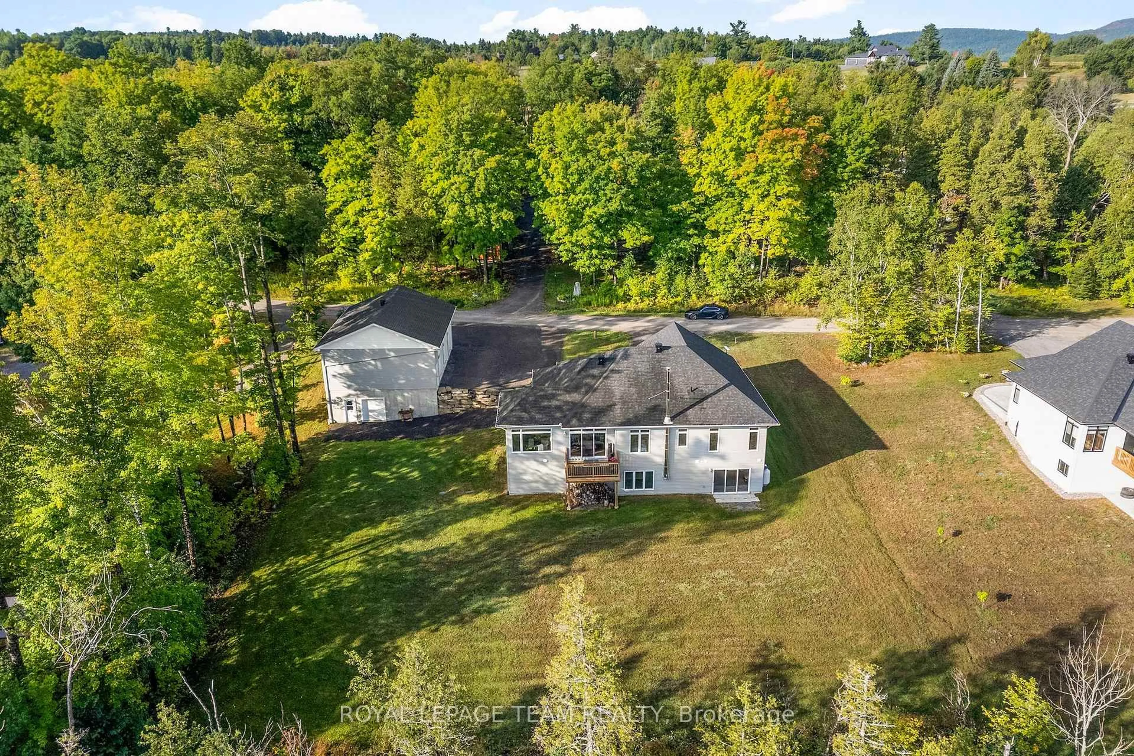 A pic from outside/outdoor area/front of a property/back of a property/a pic from drone, water/lake/river/ocean view for 44 Morning Flight Crt, Calabogie Ontario K0J 1H0