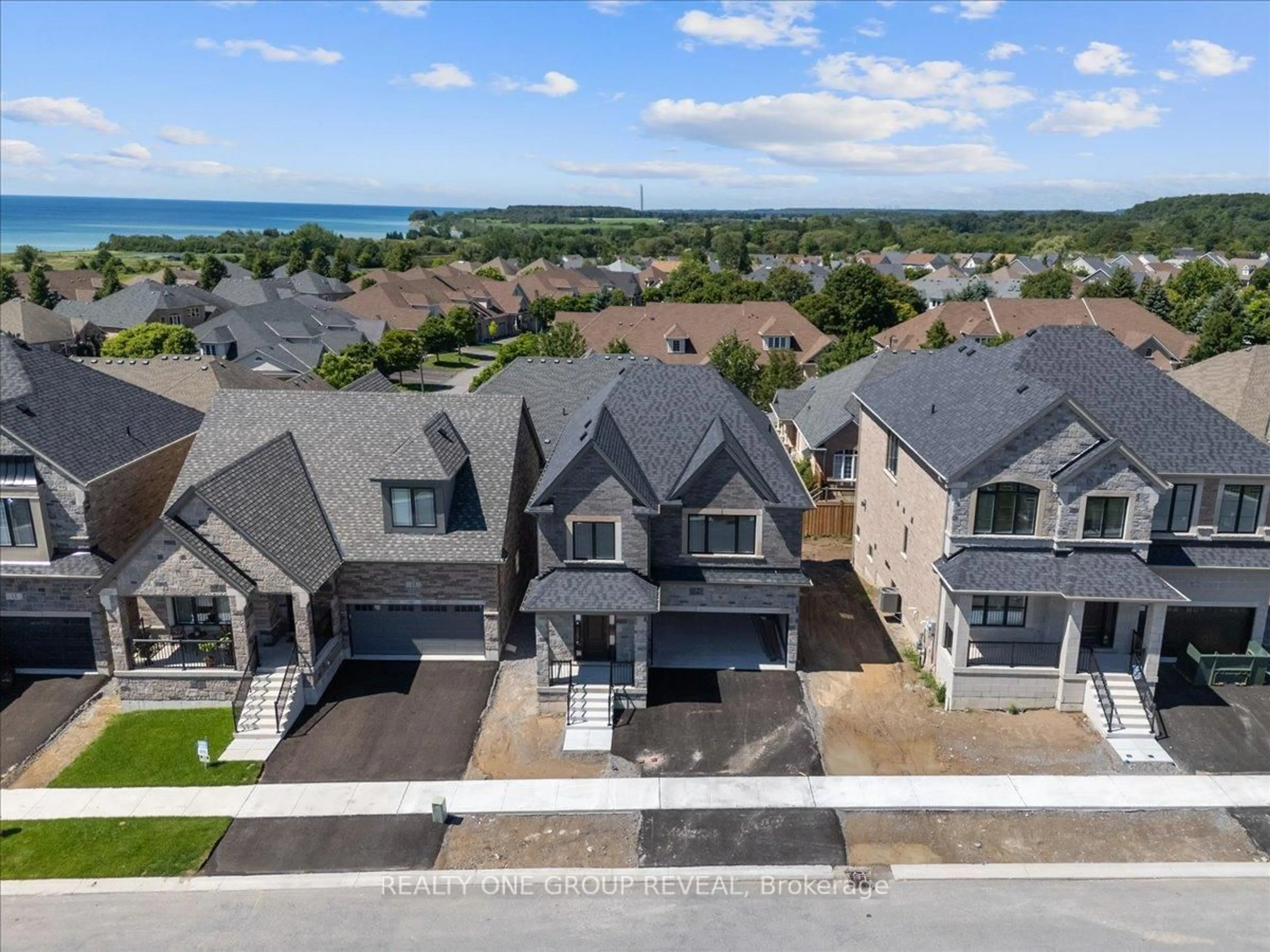 A pic from outside/outdoor area/front of a property/back of a property/a pic from drone, water/lake/river/ocean view for 9 Holland St, Port Hope Ontario L1A 0G2