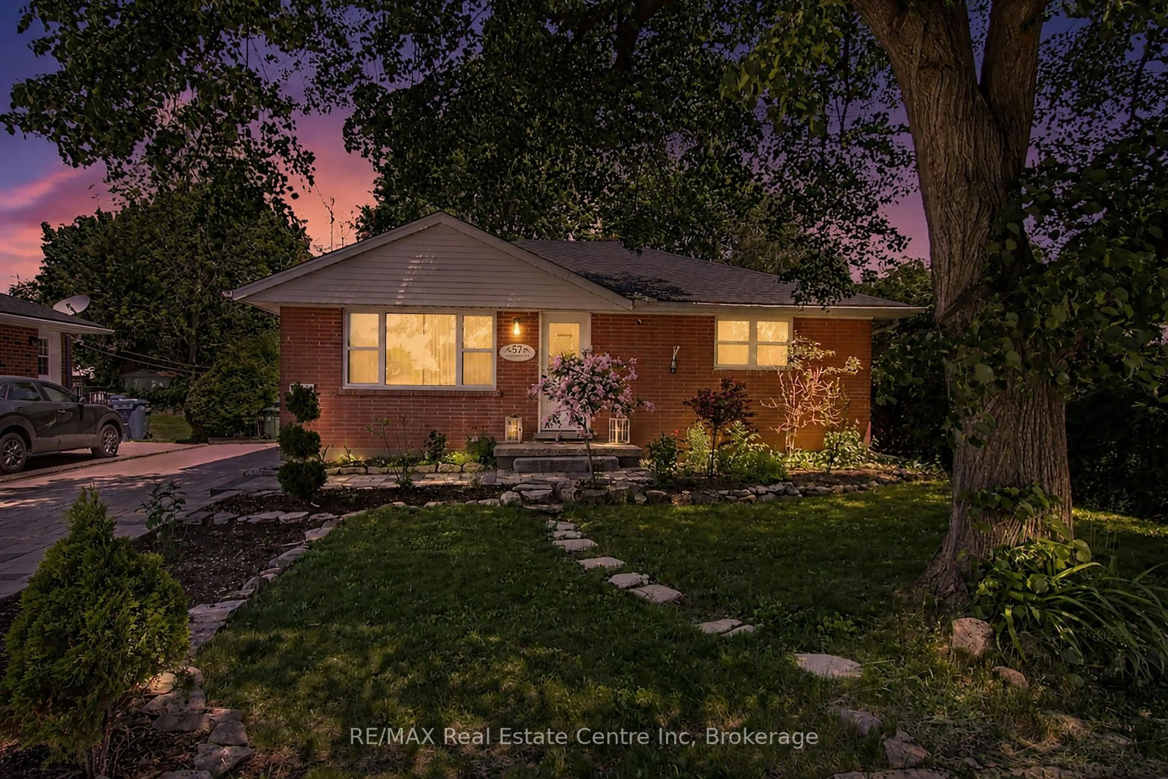 Home with brick exterior material, street for 57 Vancouver Dr, Guelph Ontario N1E 2G1