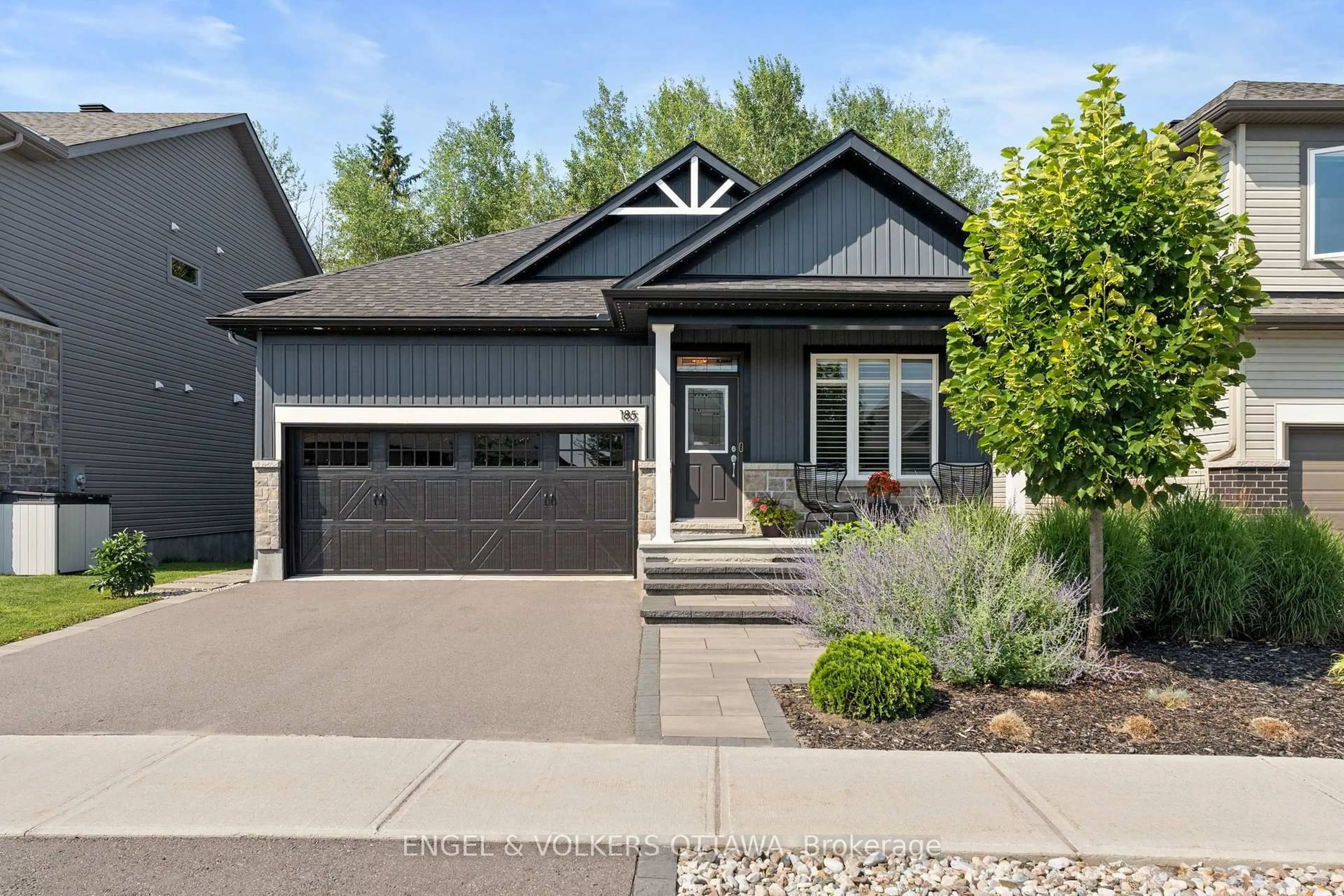Home with vinyl exterior material, street for 185 BLACKHORSE Dr, North Grenville Ontario K0G 1J0