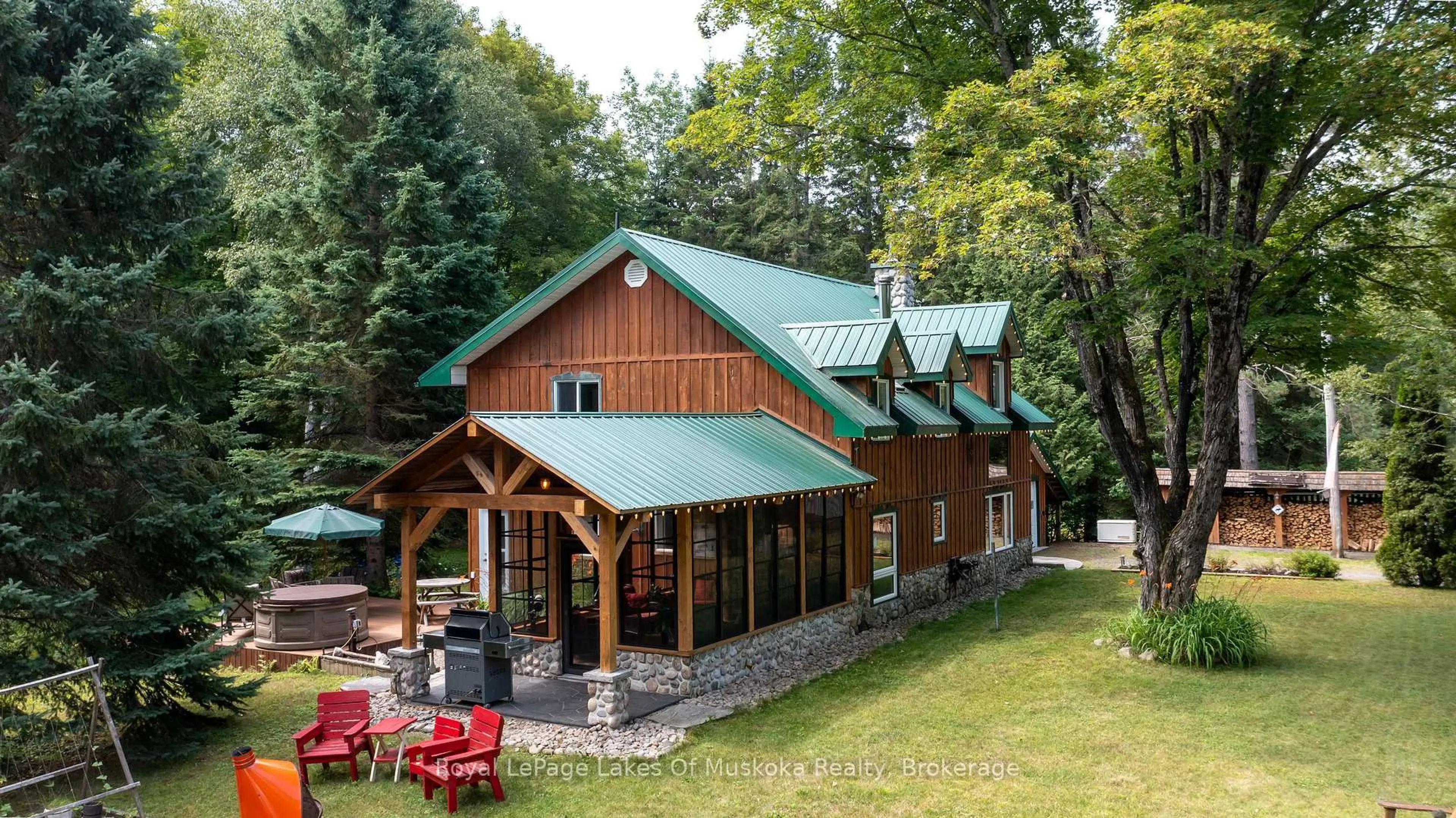 A pic from outside/outdoor area/front of a property/back of a property/a pic from drone, mountain view for 3650 Muskoka Road 117, Lake of Bays Ontario P0B 1A0