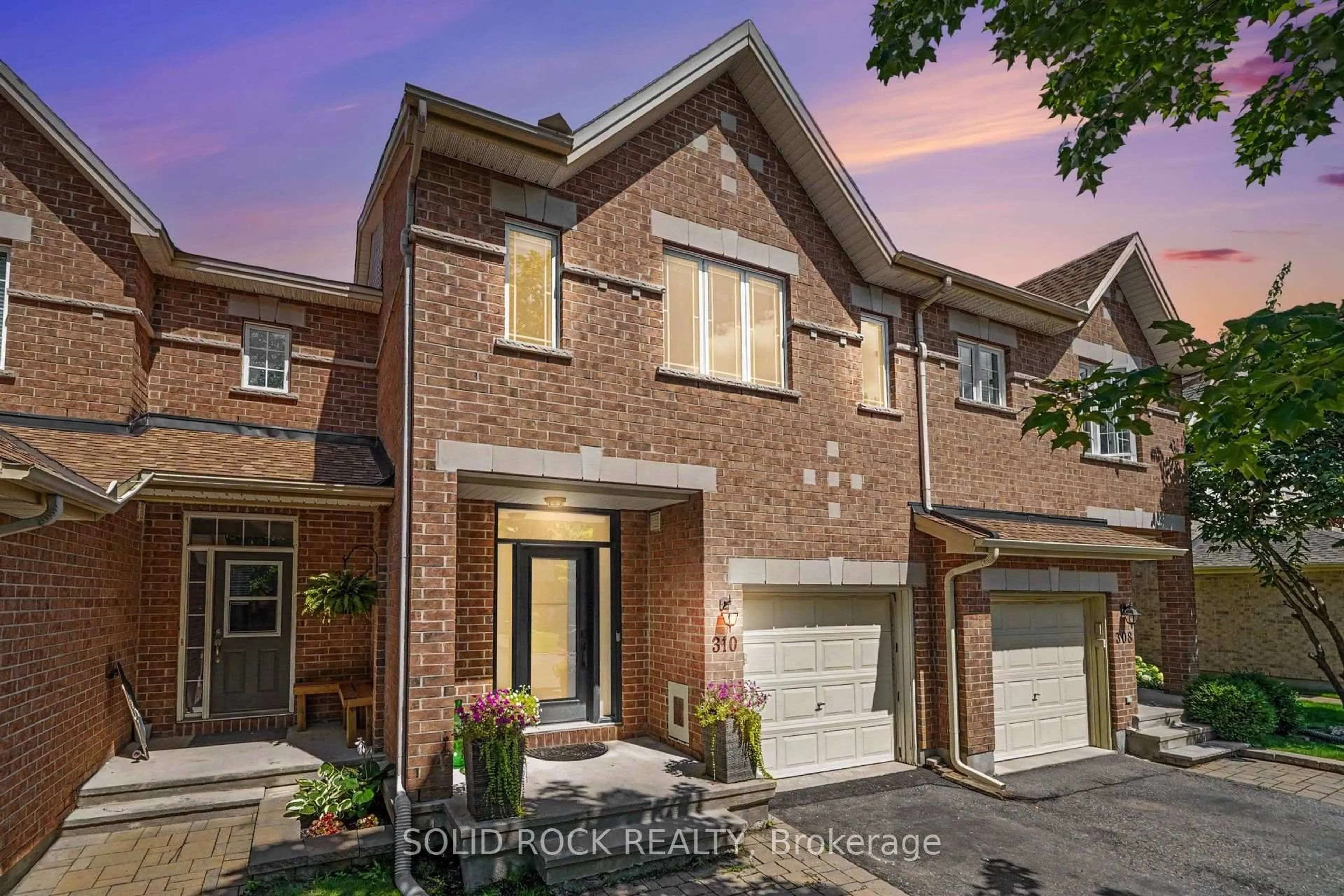Home with brick exterior material, street for 310 Grey Seal Circ, Ottawa Ontario K1V 2H3