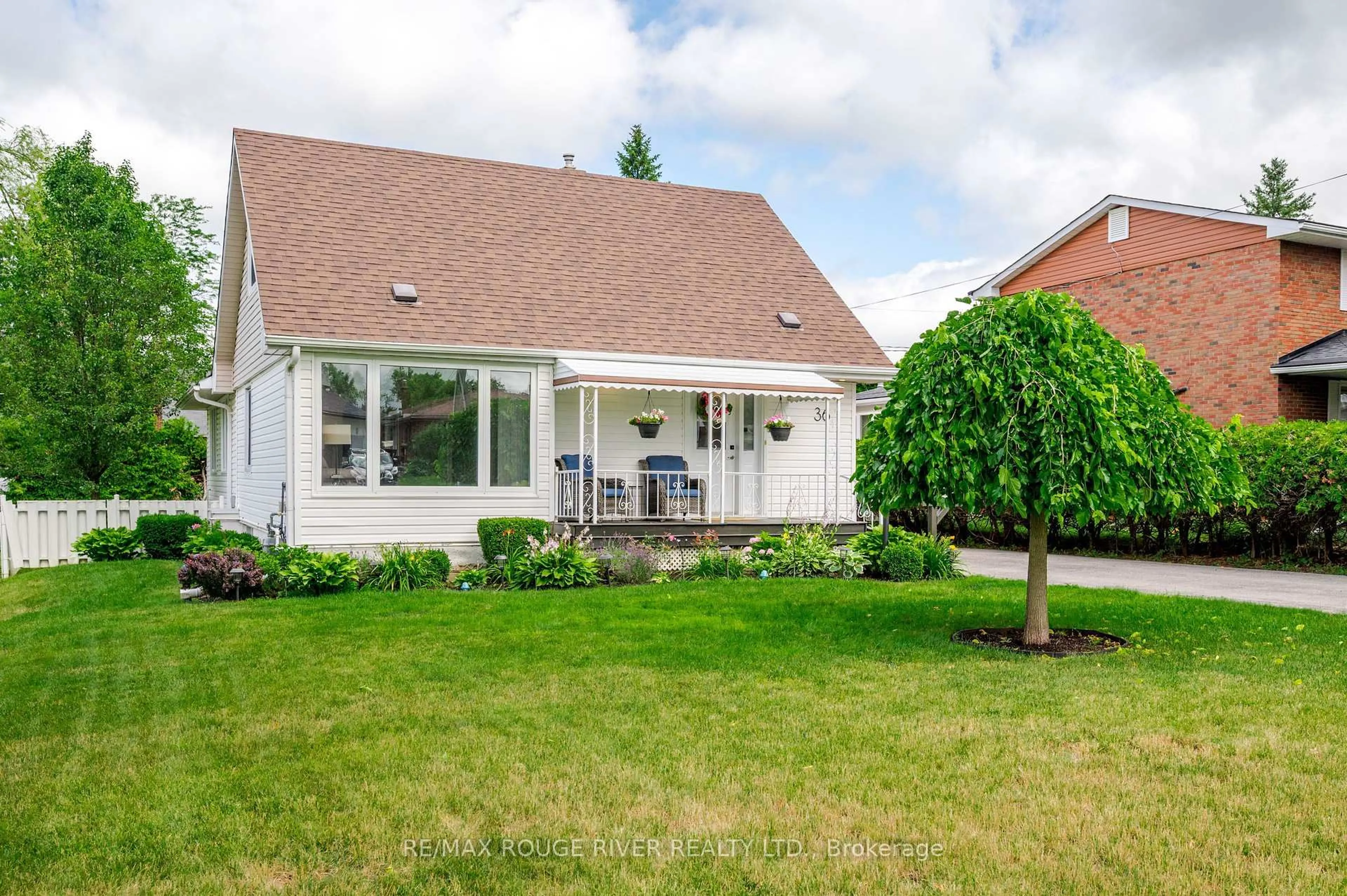 Home with vinyl exterior material, street for 36 Kawartha Dr, Kawartha Lakes Ontario K9V 1A5